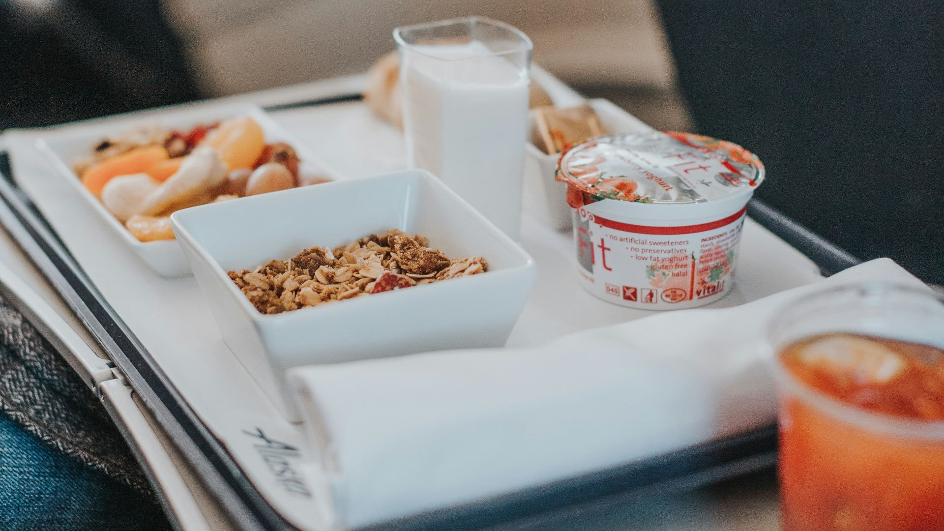 red liquid on cup beside bowl