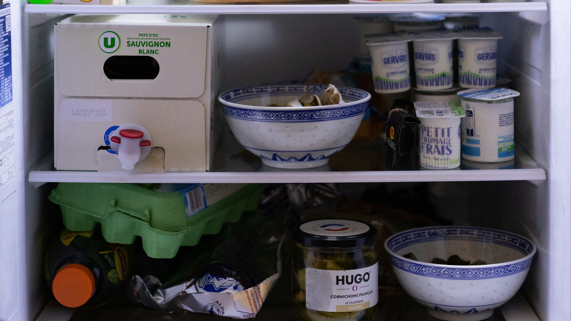 an open refrigerator filled with lots of food