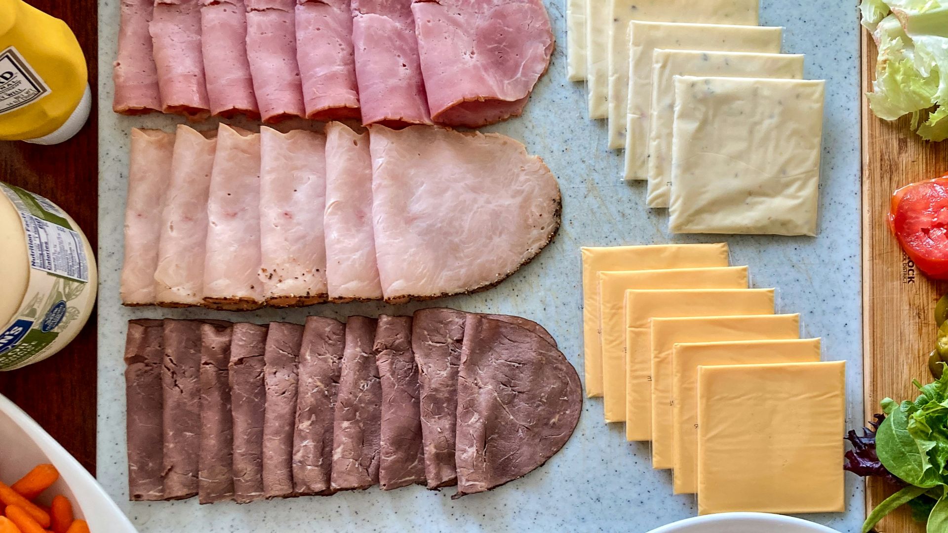 a variety of food is laid out on a table