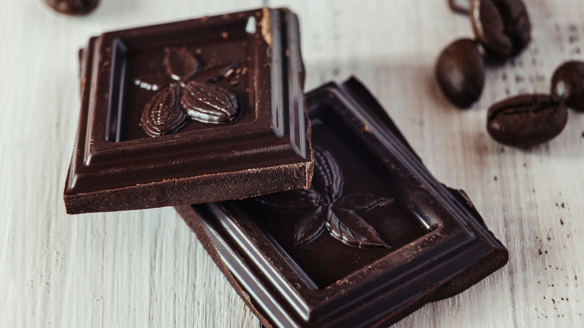 a couple of pieces of chocolate sitting on top of a table