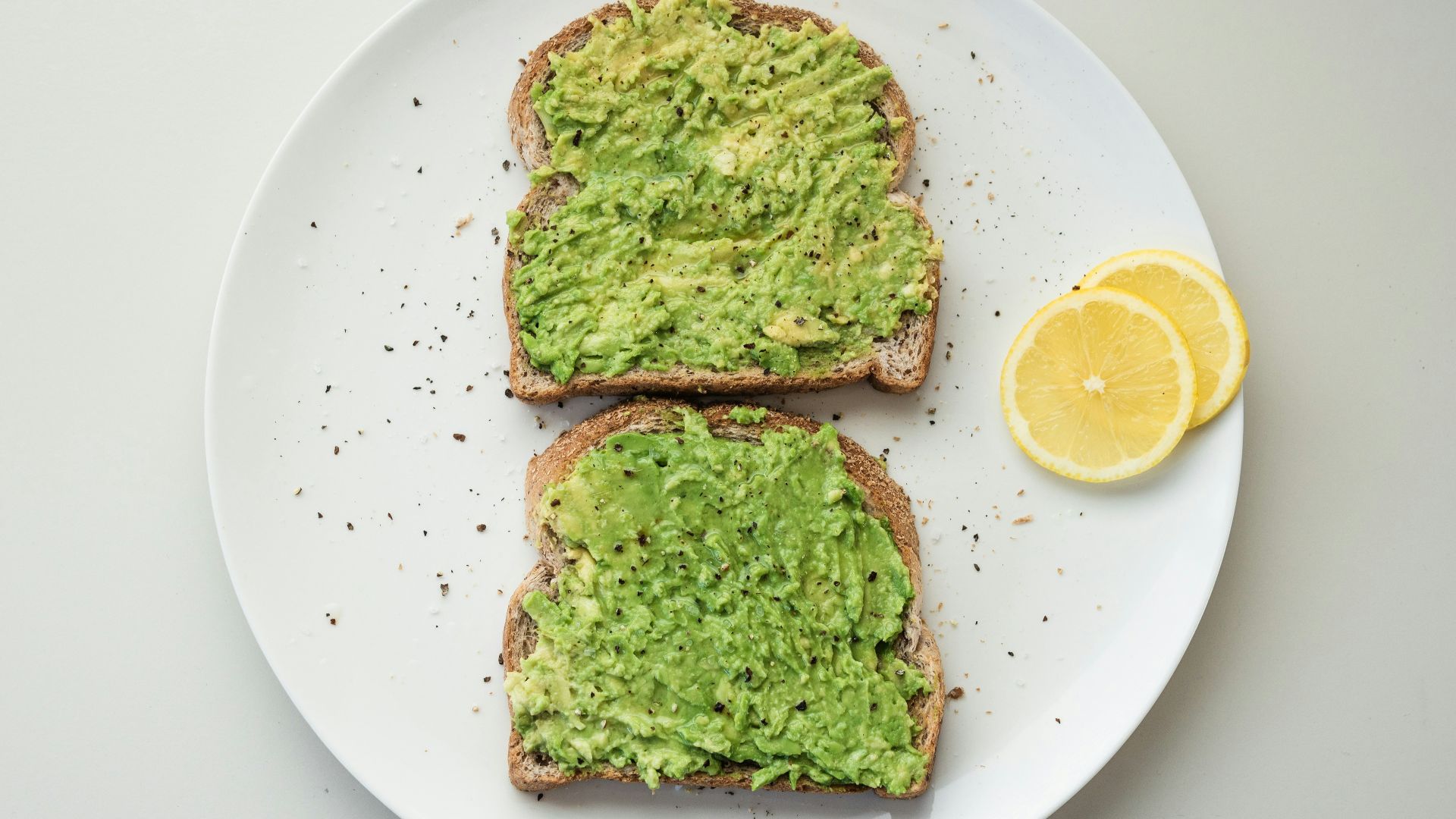 green and brown vegetable on white ceramic plate