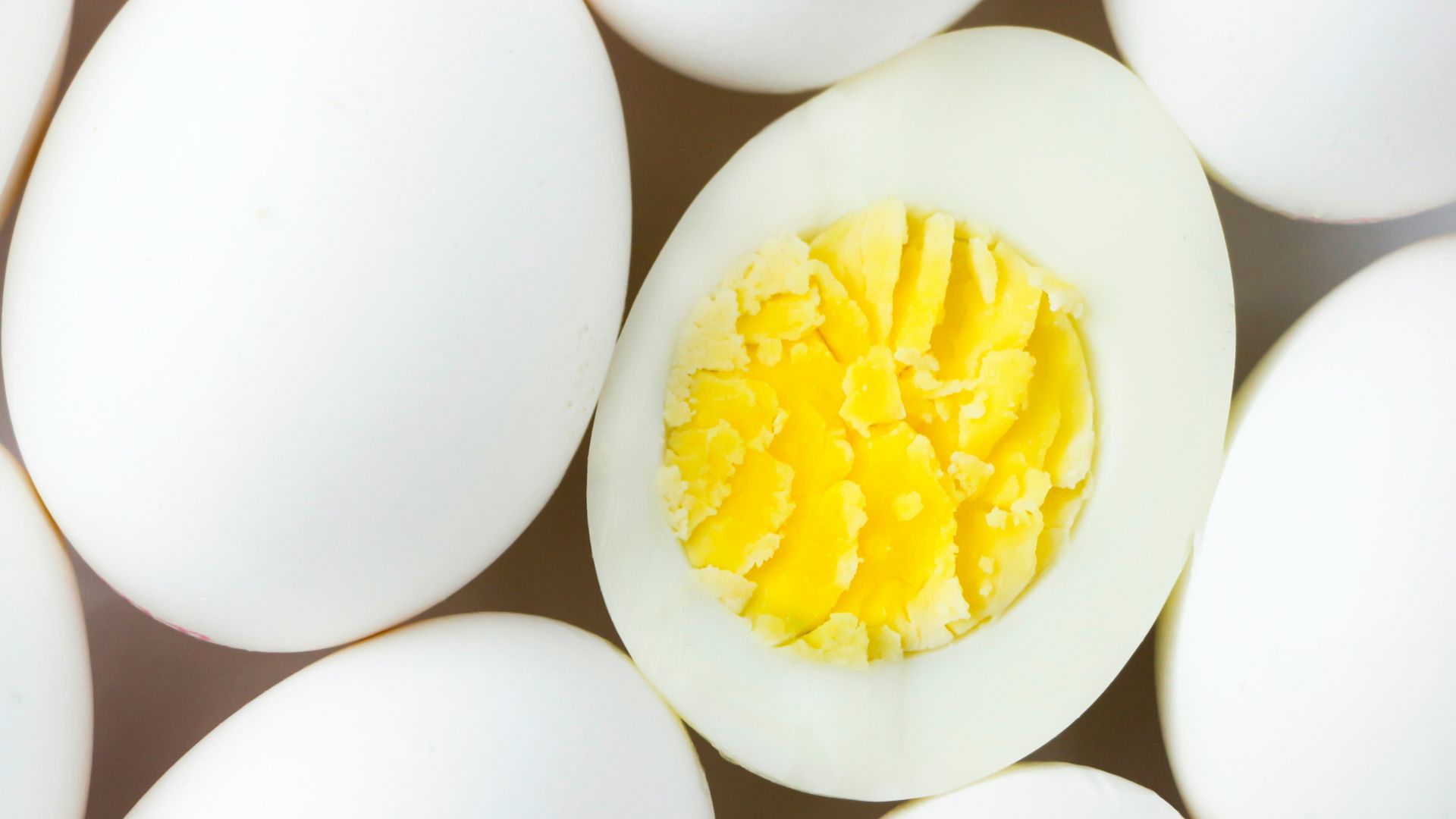 white egg lot on brown wooden table
