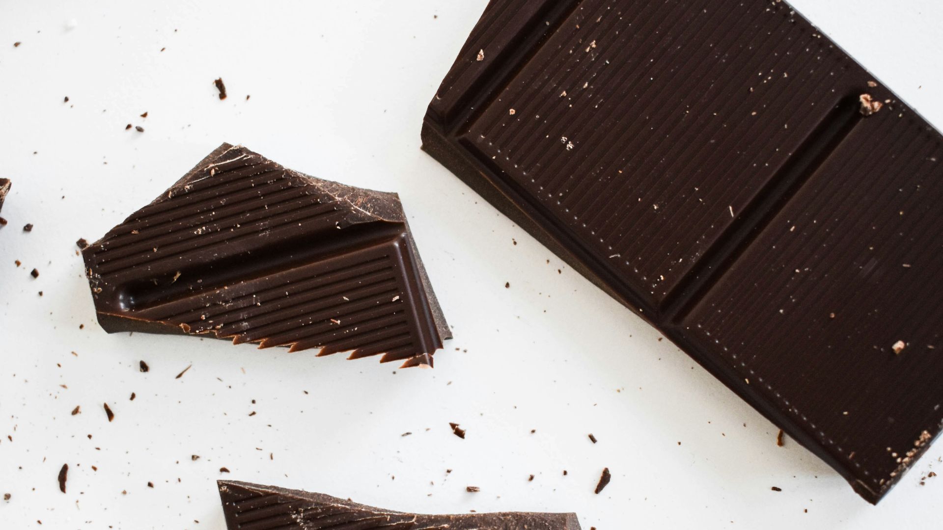 four pieces of chocolate sitting on top of each other