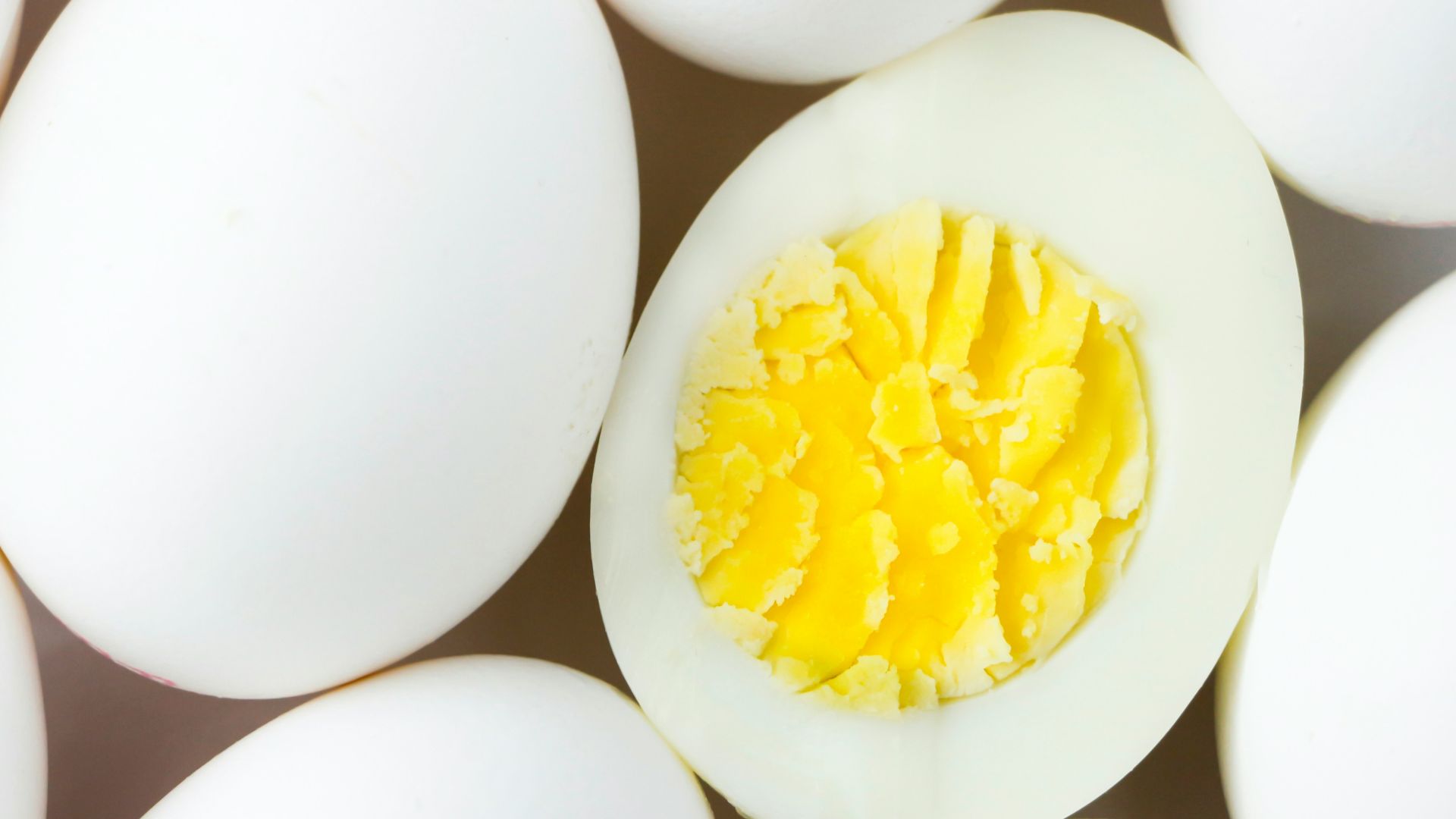 white egg lot on brown wooden table