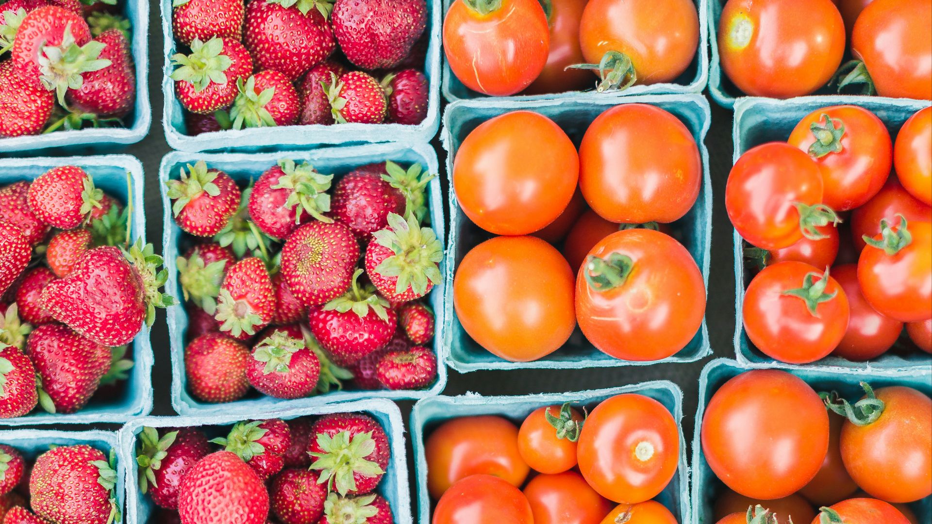 flat lay photography of strawberries and tomatoes