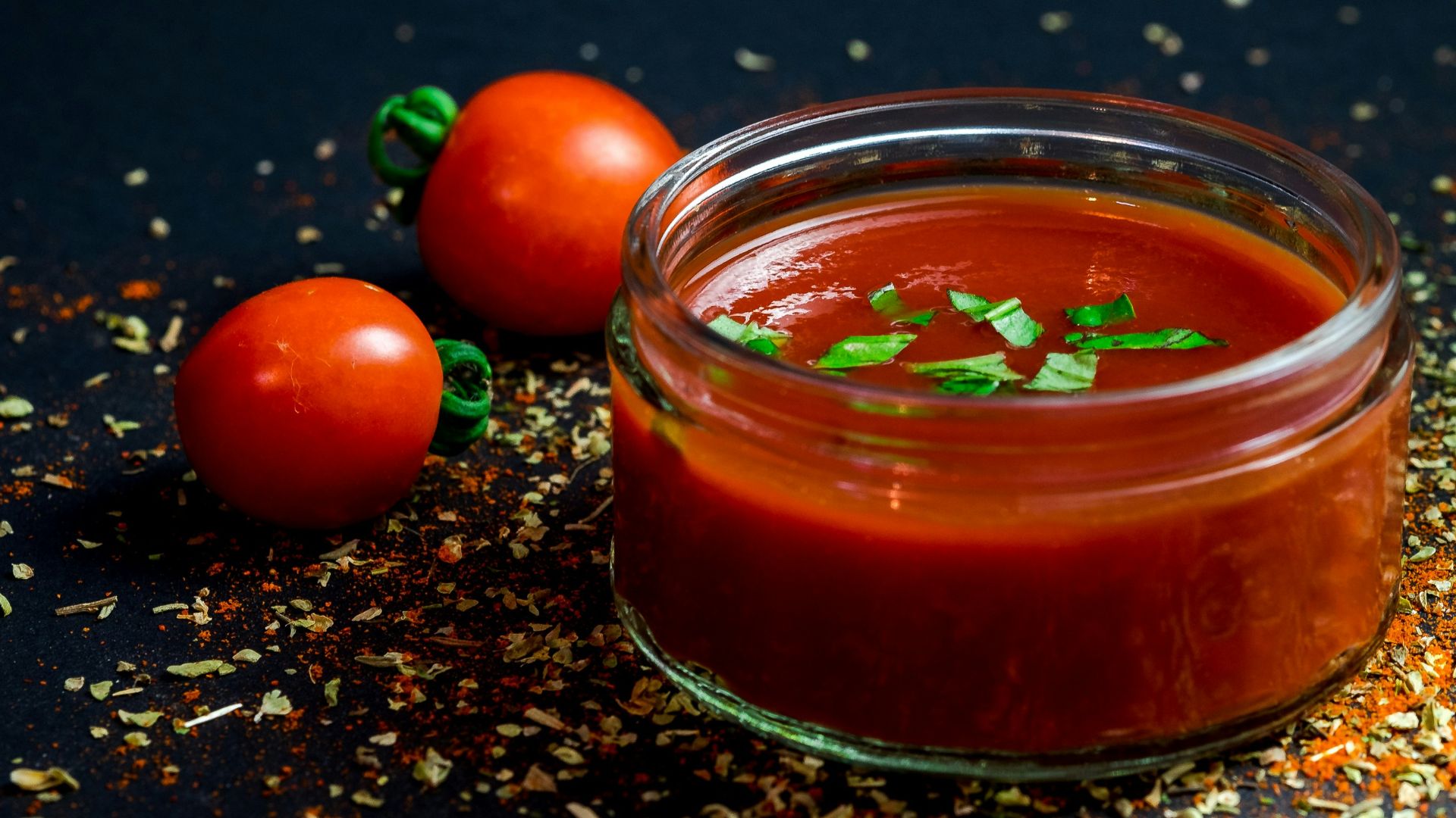 tomato and tomato puree with parsley in bowl