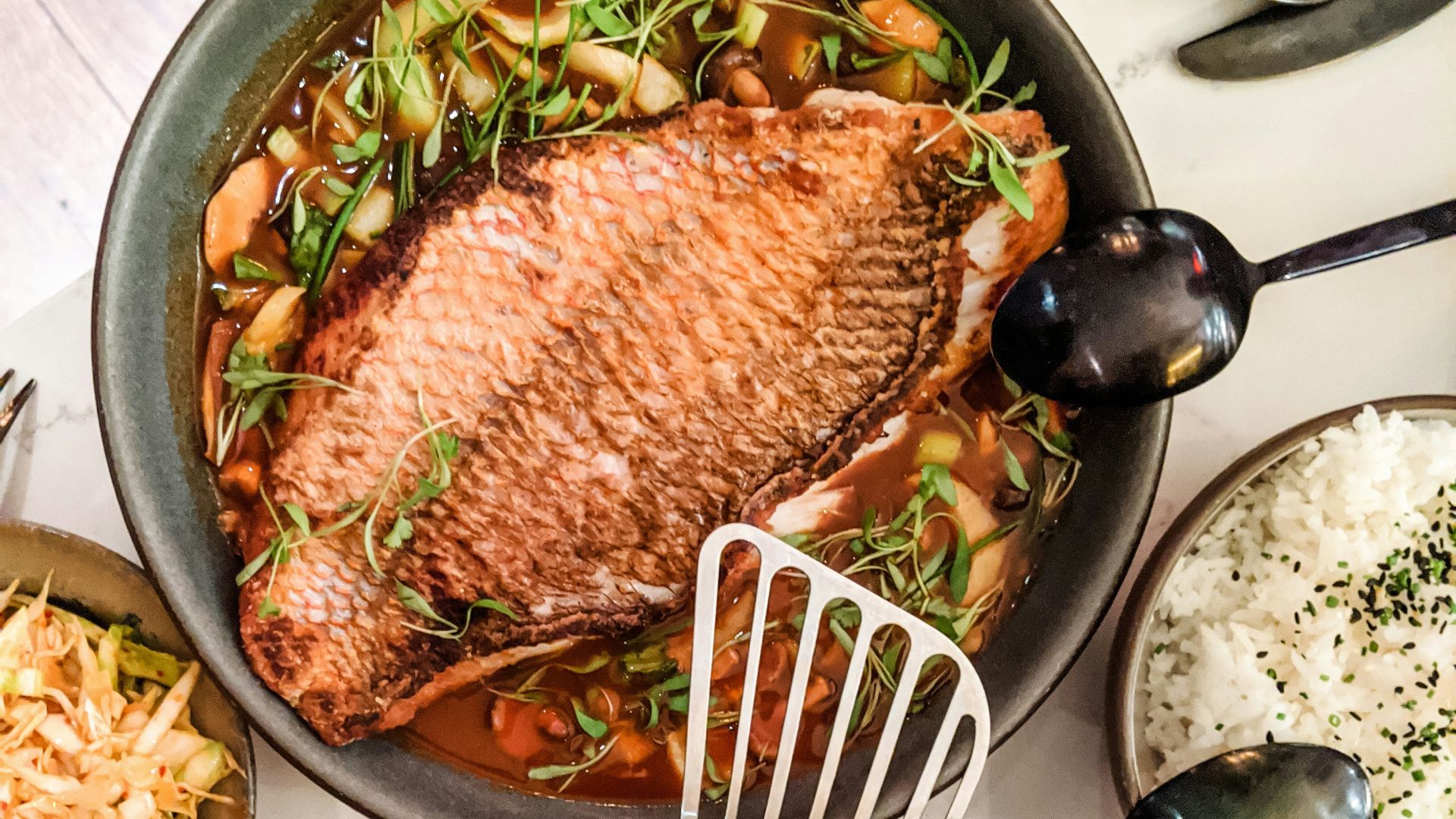 cooked stew fish on cooking pot