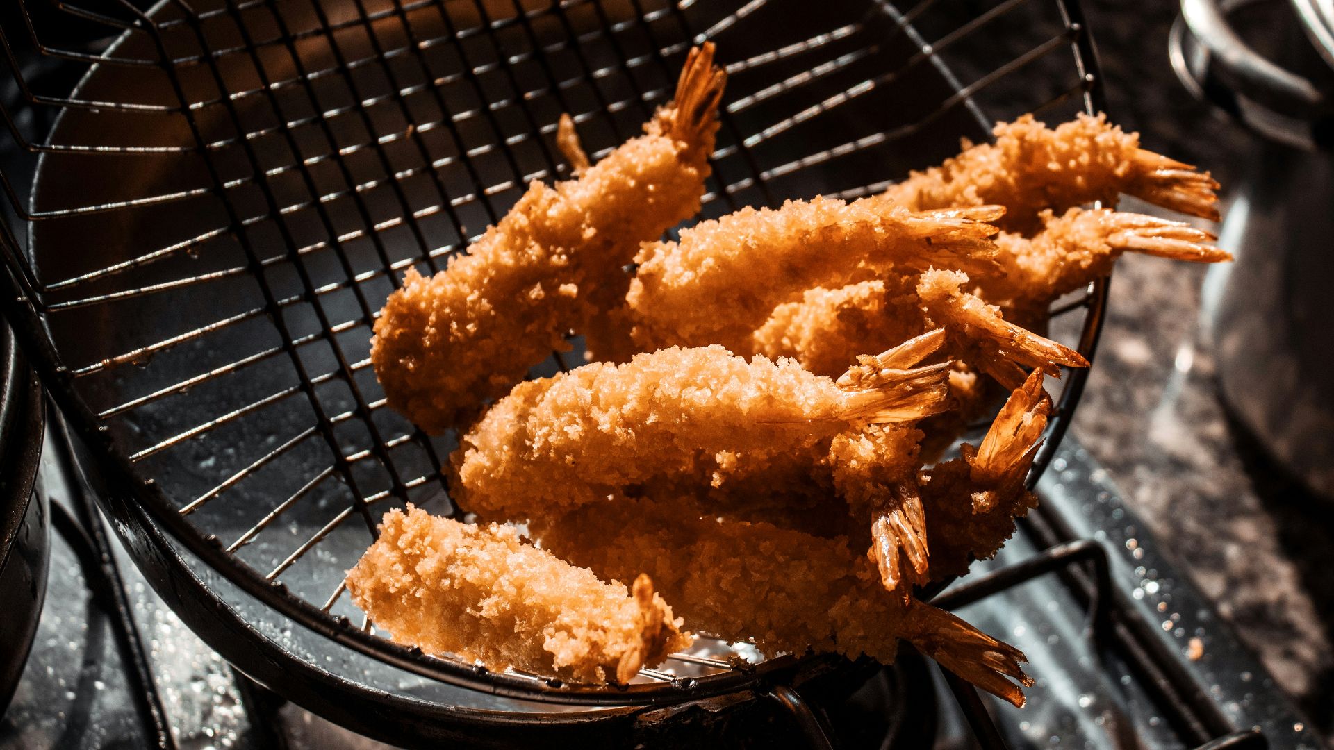 a group of chicken on a grill