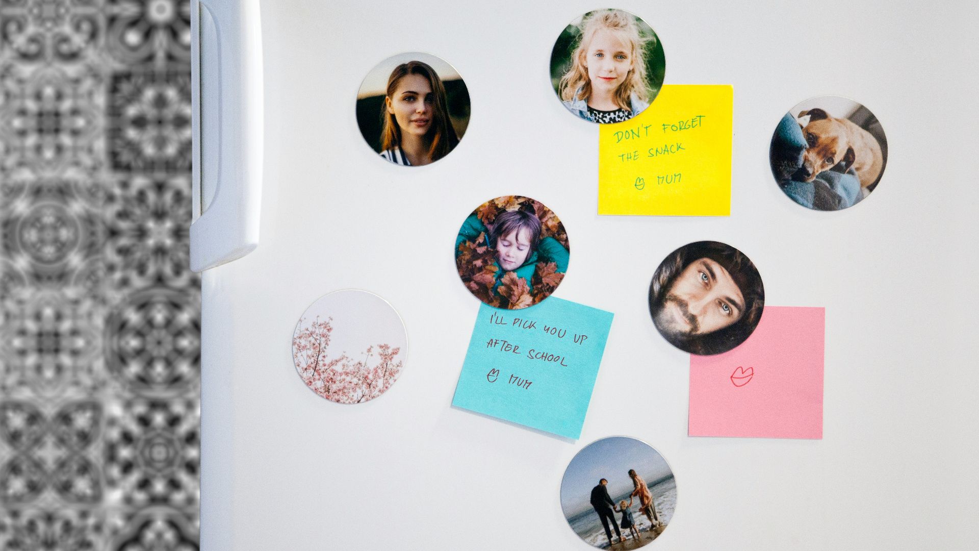 a refrigerator with magnets and pictures on it
