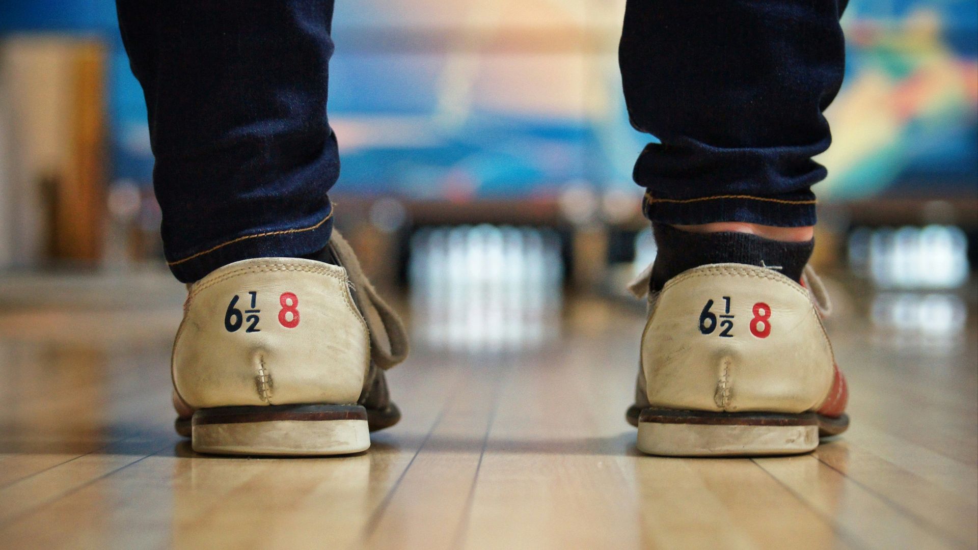 person standing on bowling court