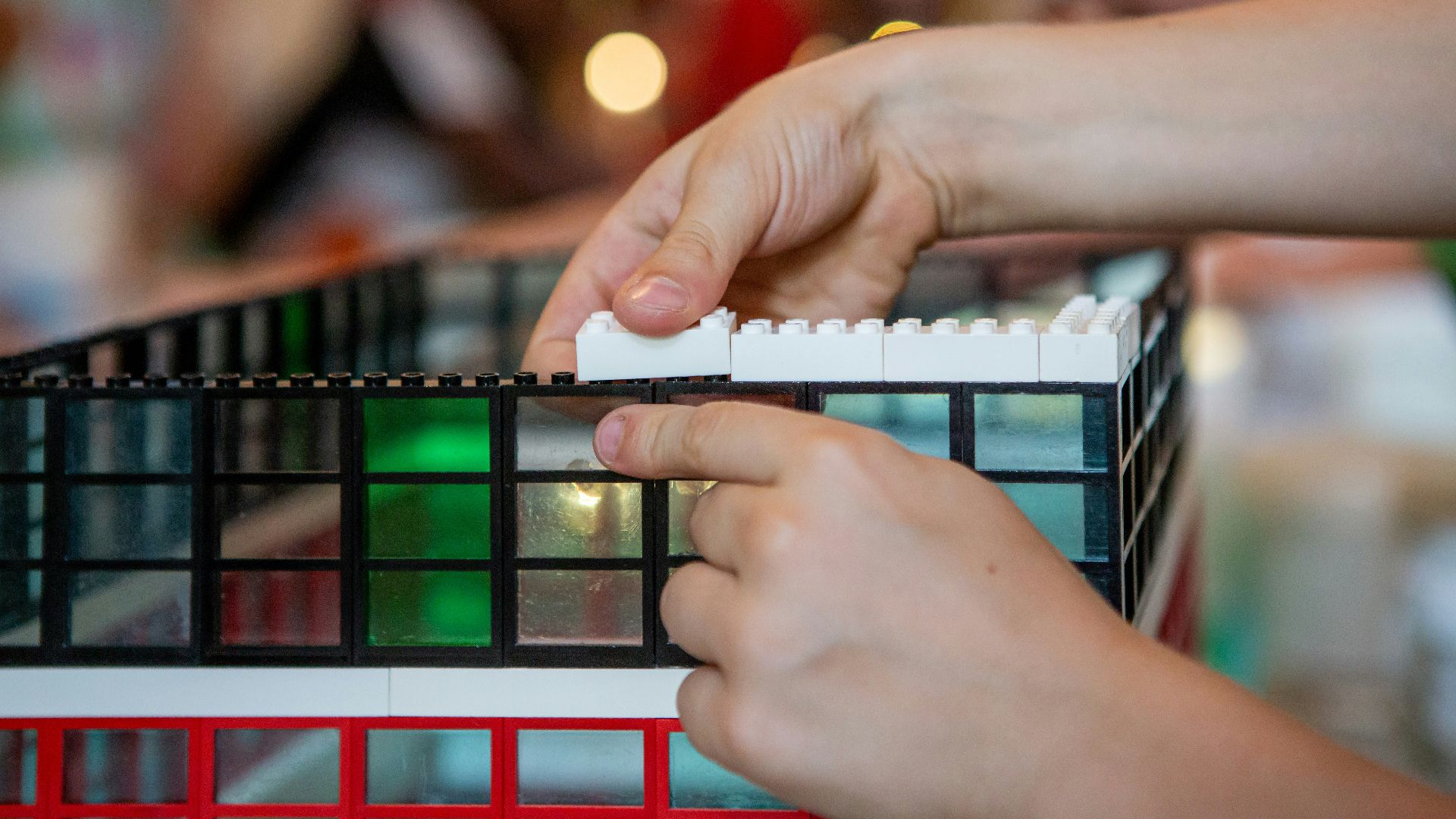 close-up of hands holding a device