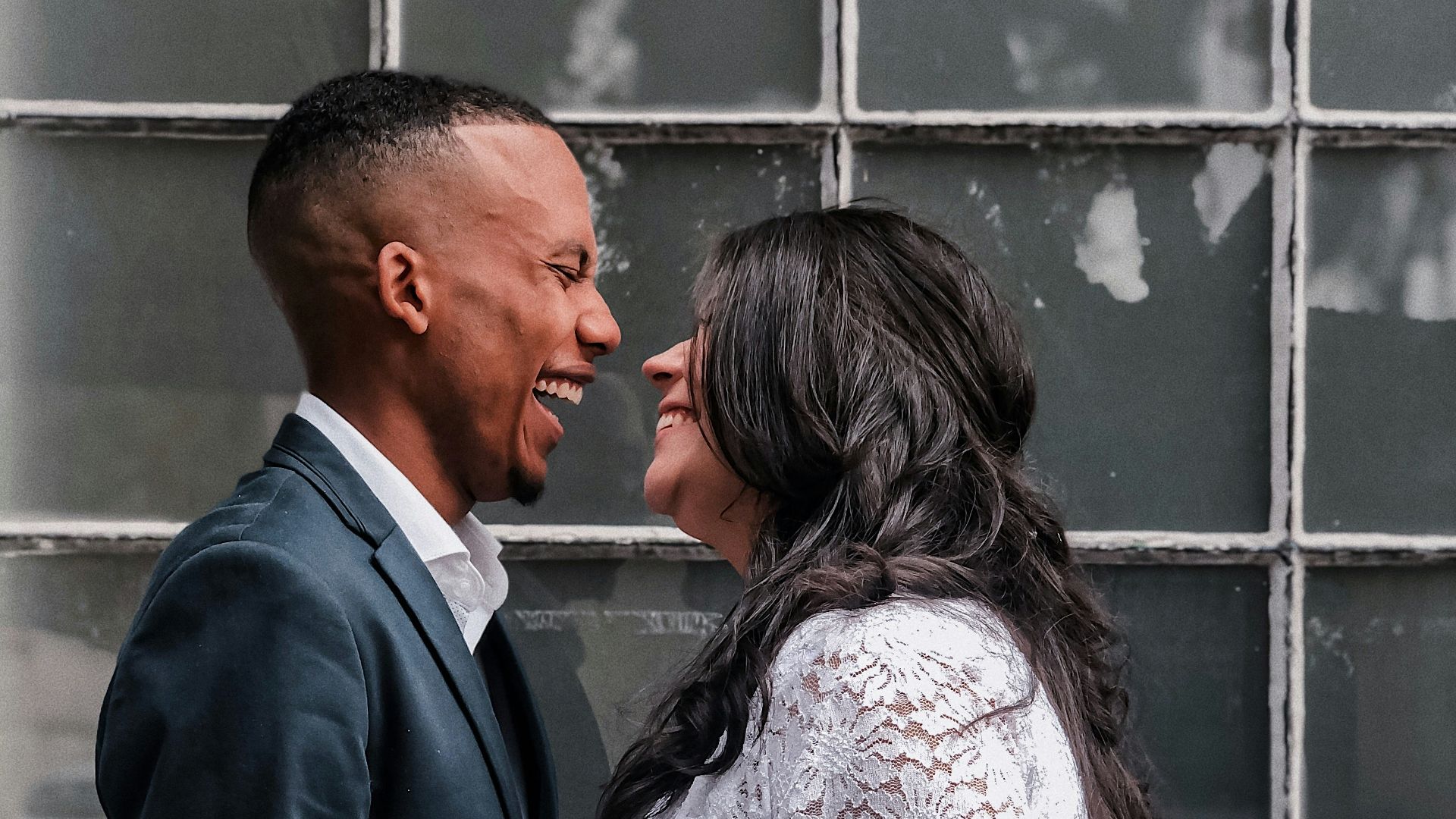 a man and a woman standing next to each other