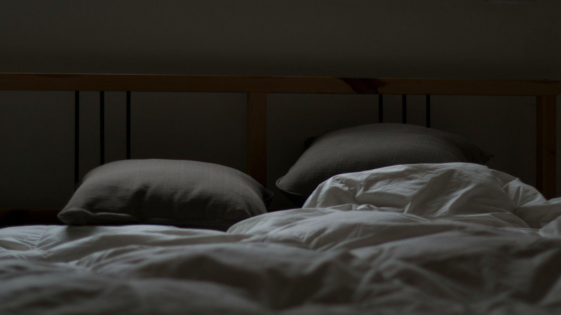 empty white and gray bed set