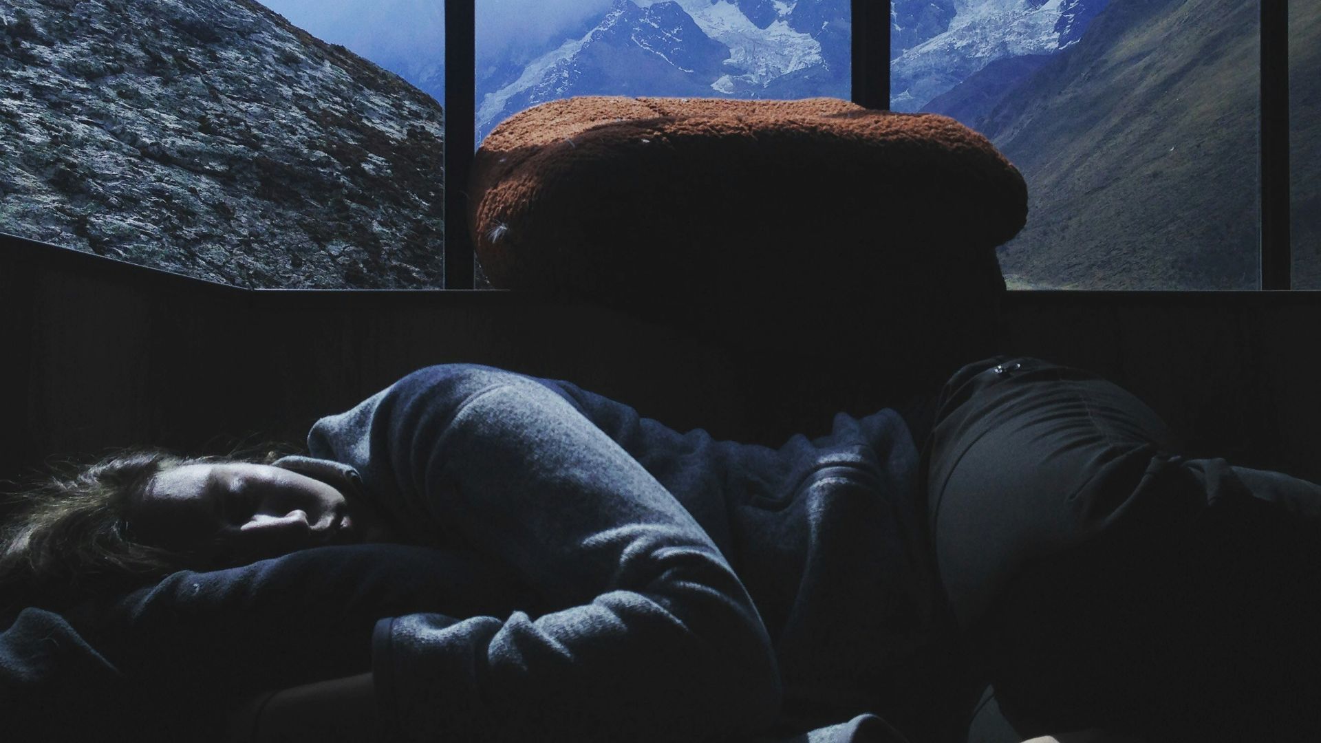 person sleeping near window