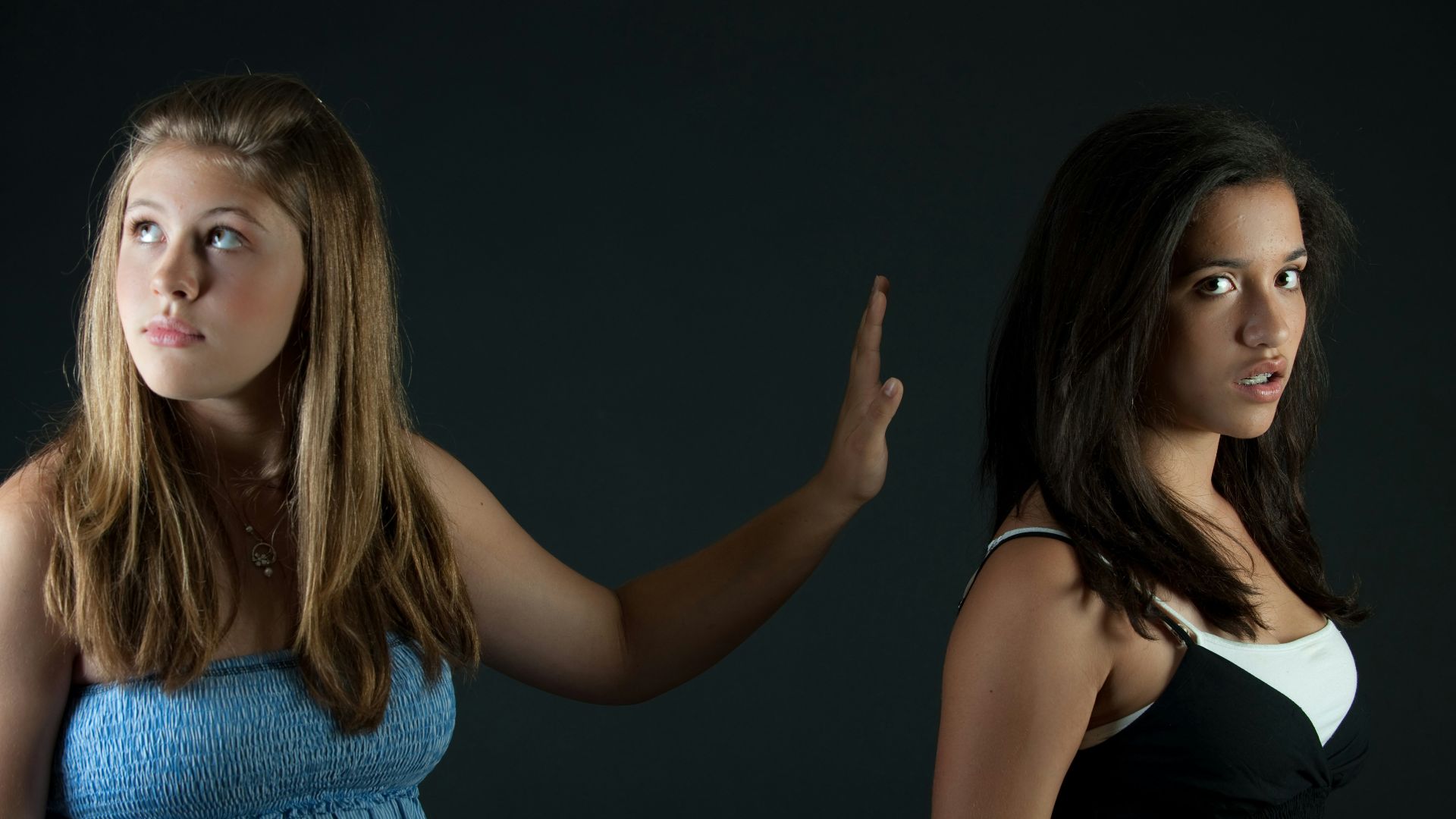 girl in blue sleeveless dress