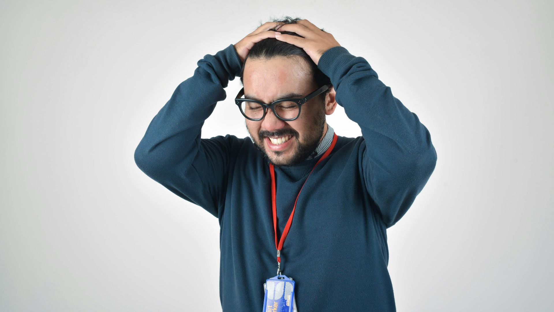 man in bluee ssweater