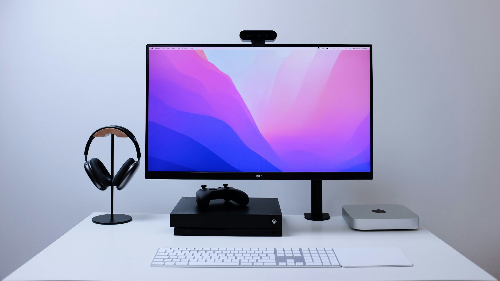 a computer monitor sitting on top of a desk