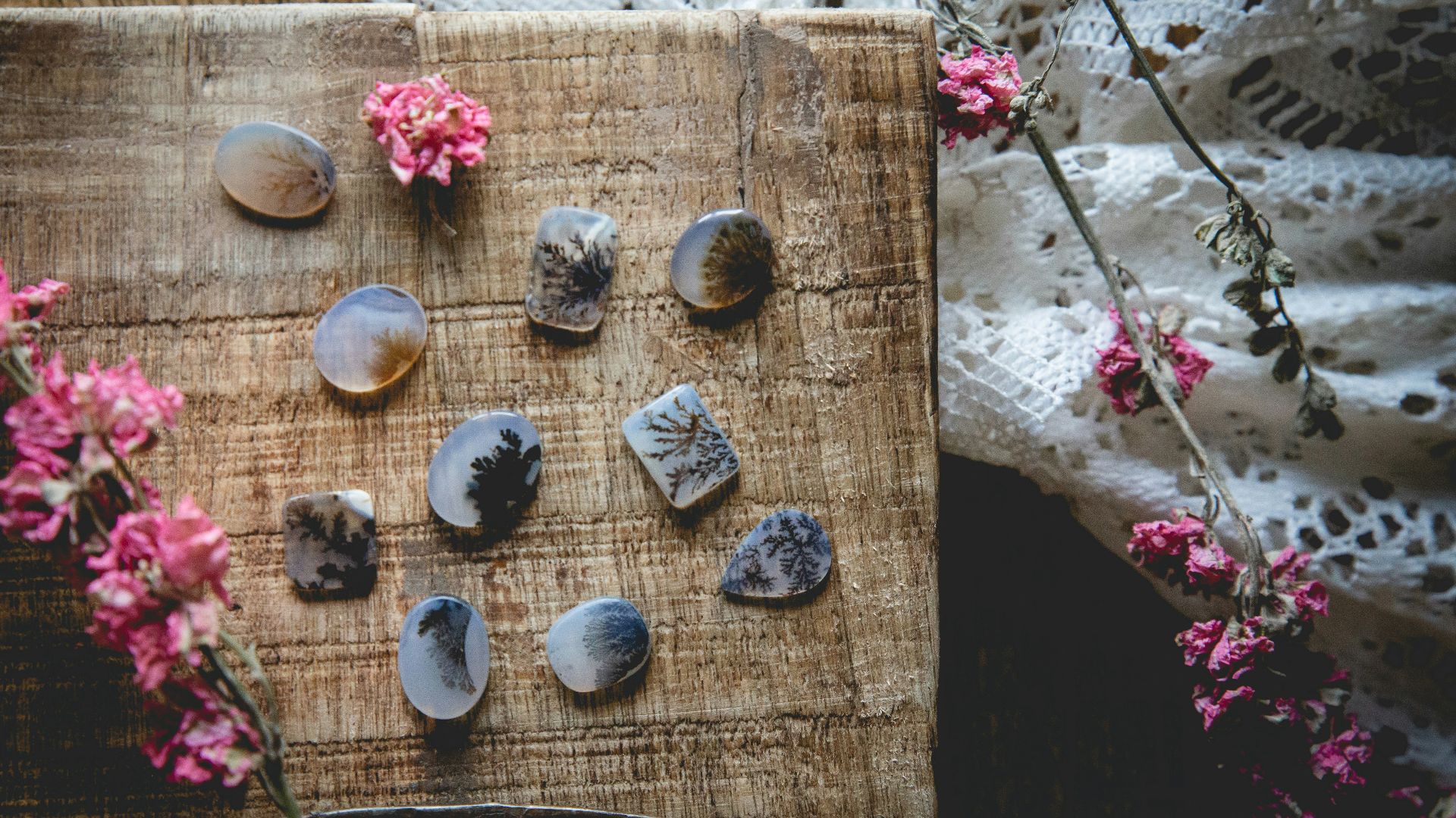 gray stones on brown wooden board