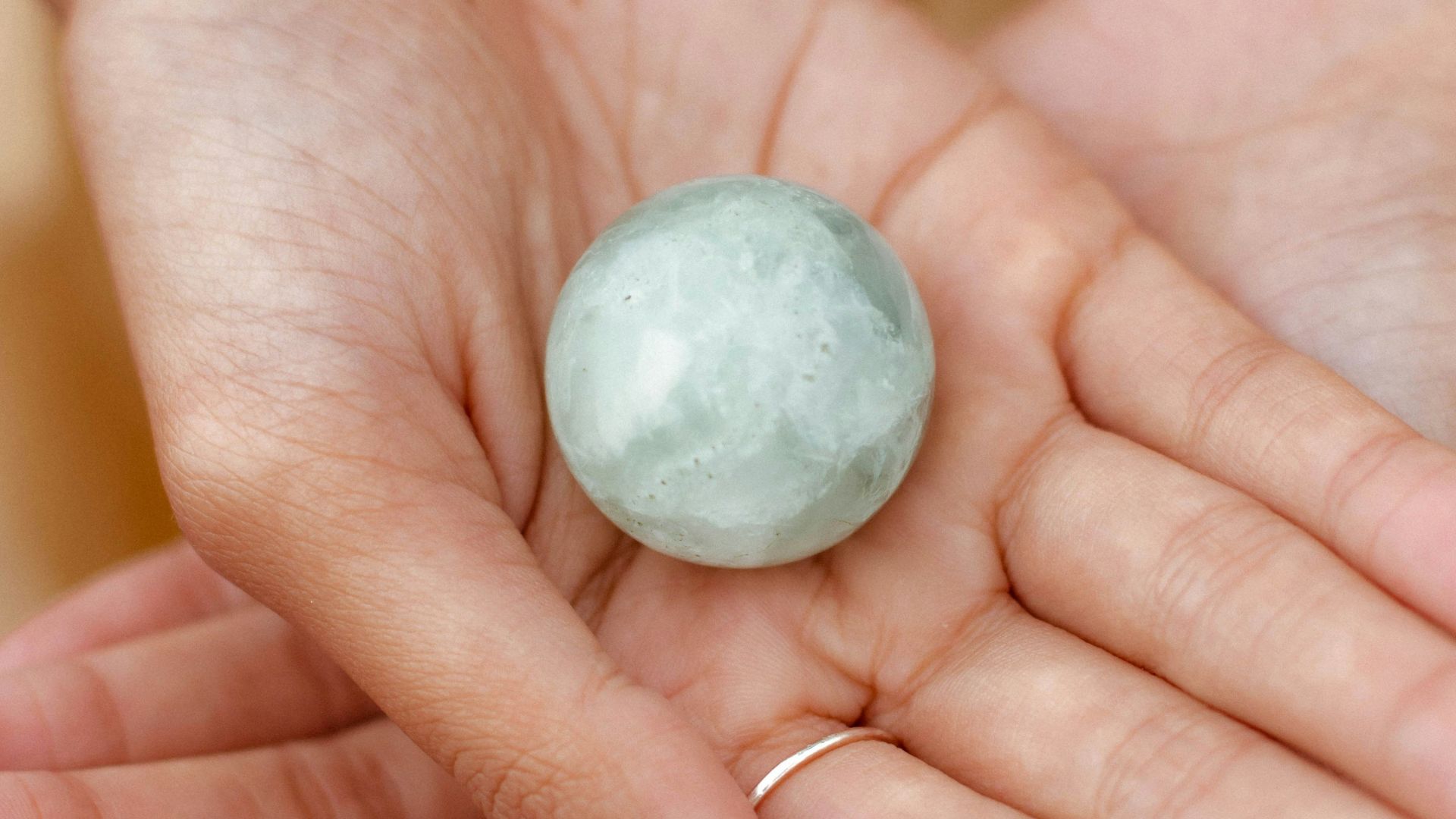 a hand holding a rock