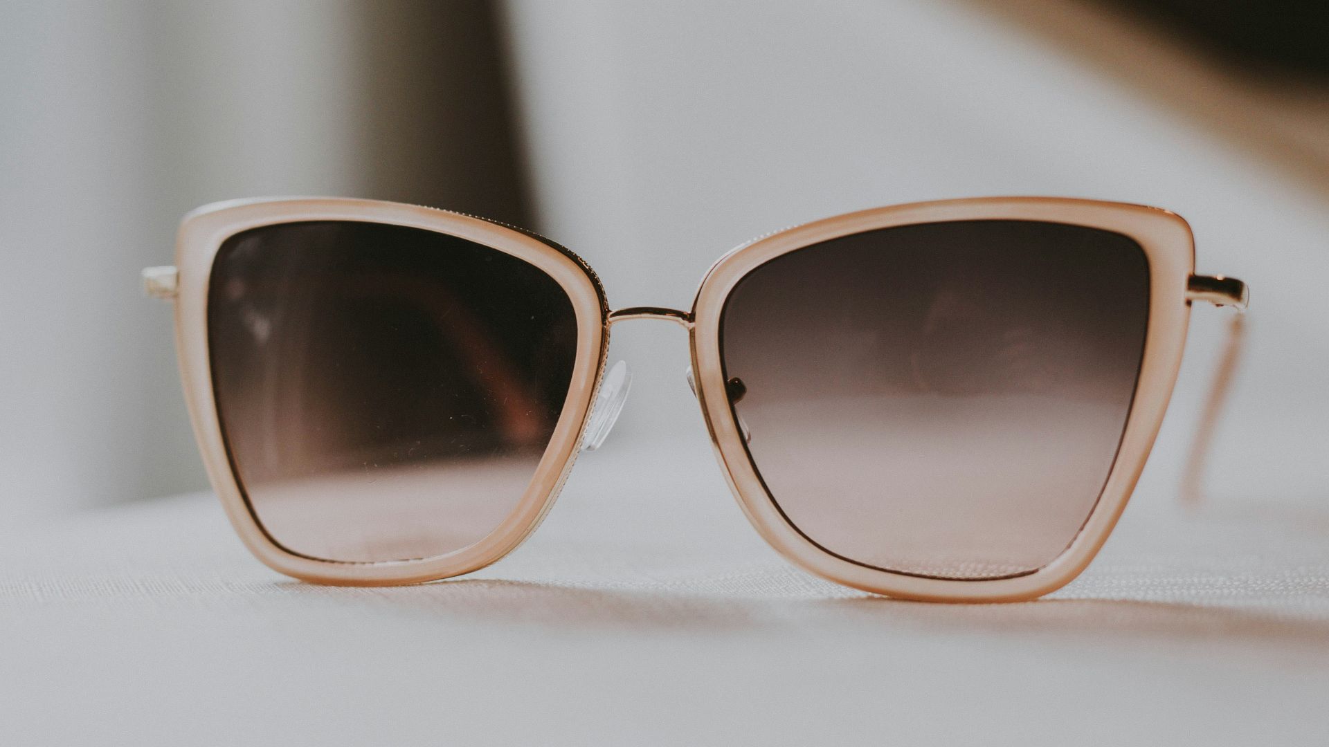 gray sunglasses with white frames