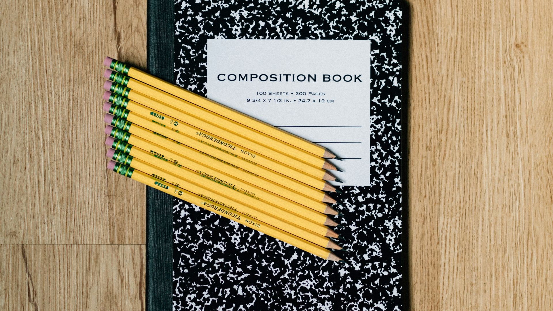 white and black card on brown wooden table