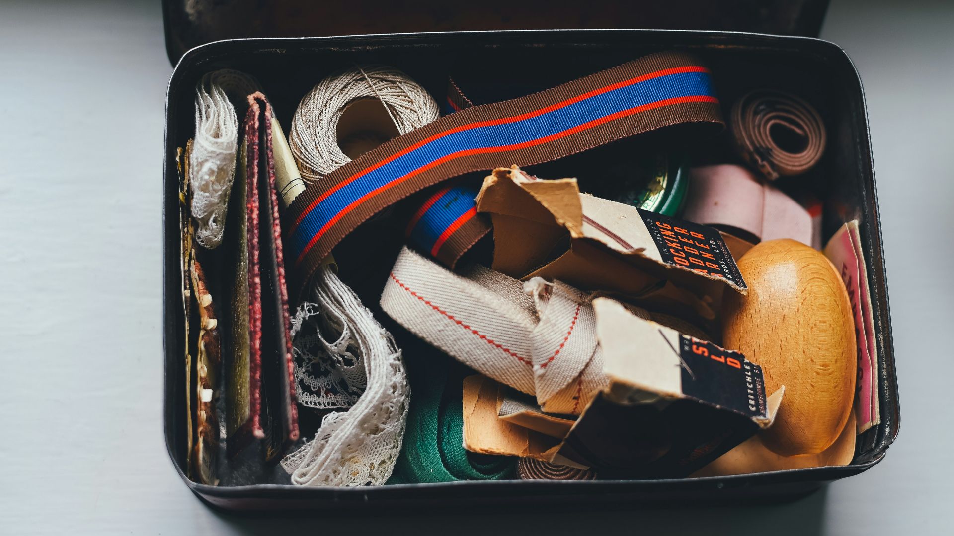 assorted belts and packs on metal case