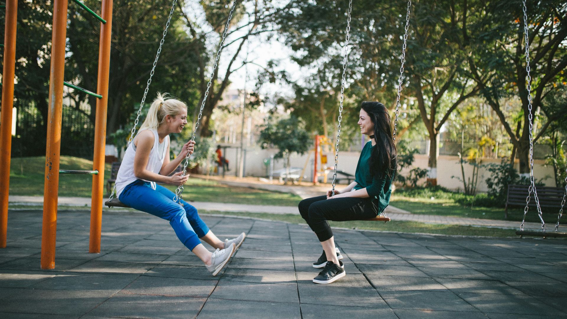 woman sitting on swing