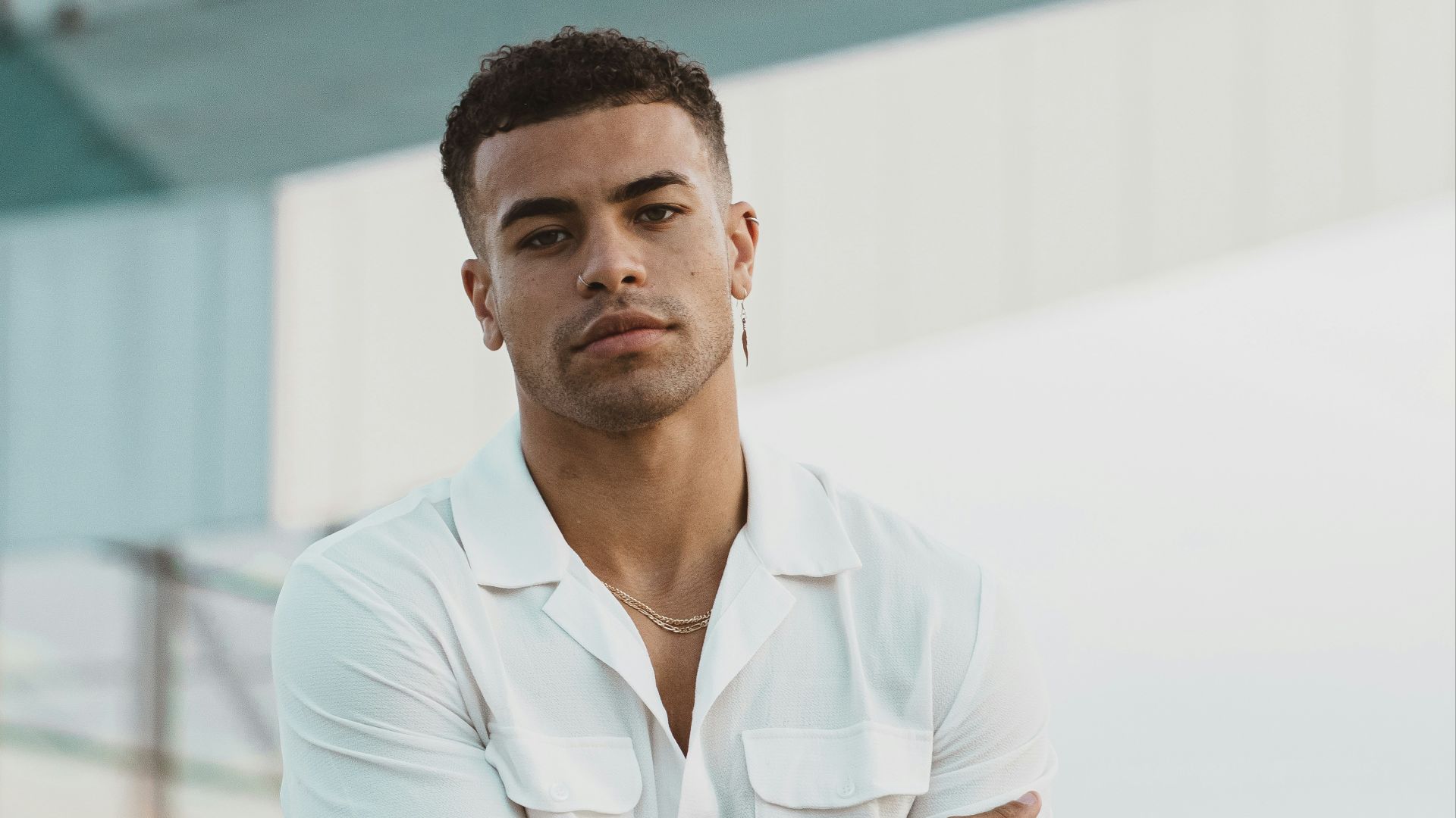 man in white polo shirt