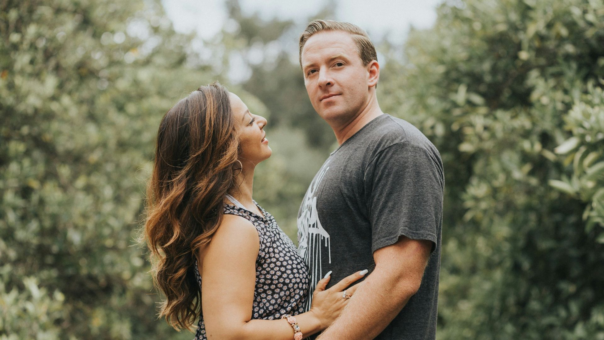 man and woman hugging during daytime