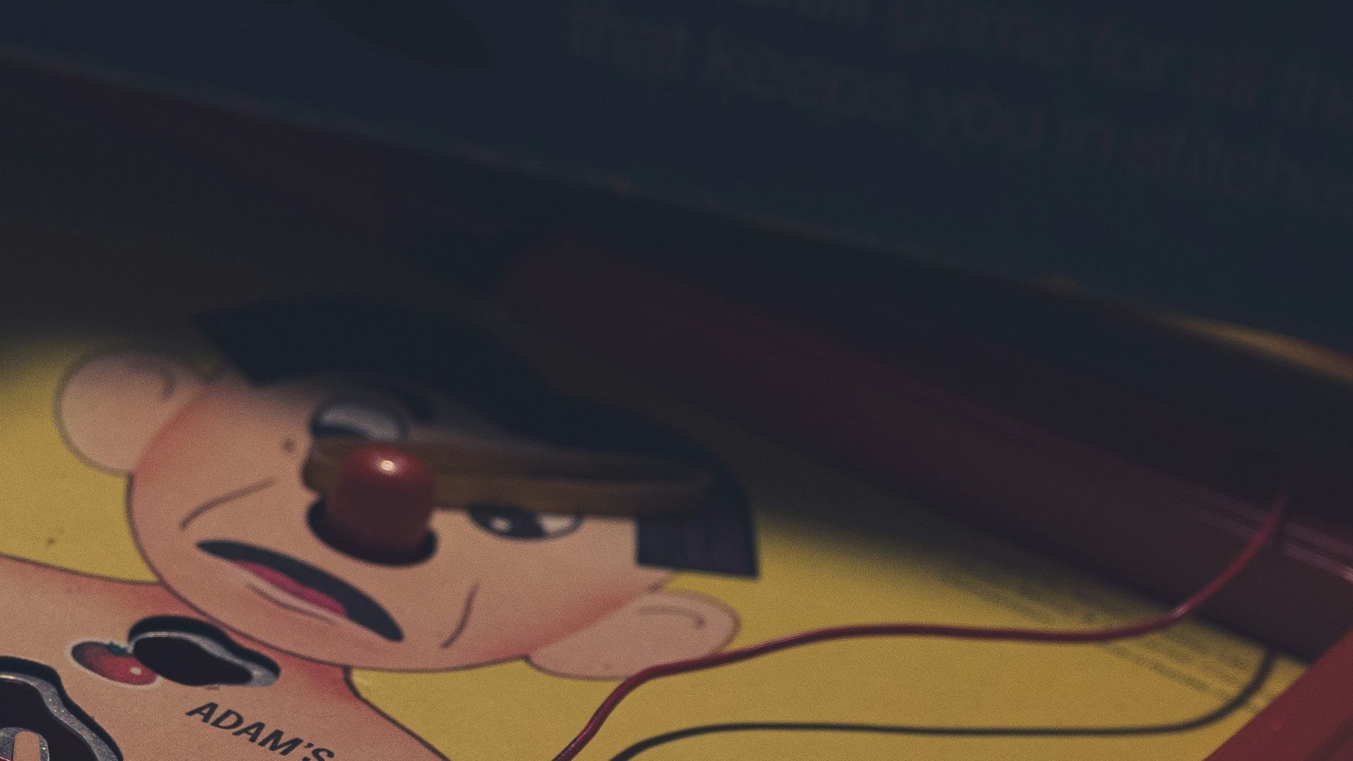 a close up of a game board with a person on it