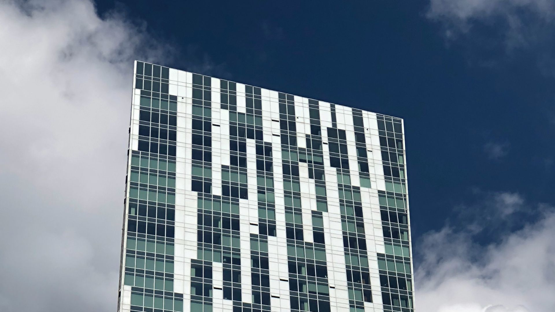 a very tall building with many windows on it