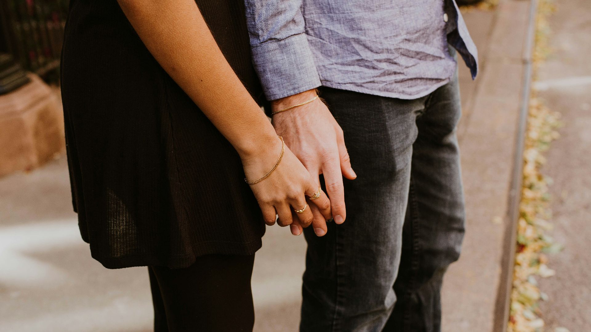 woman touching man's hand