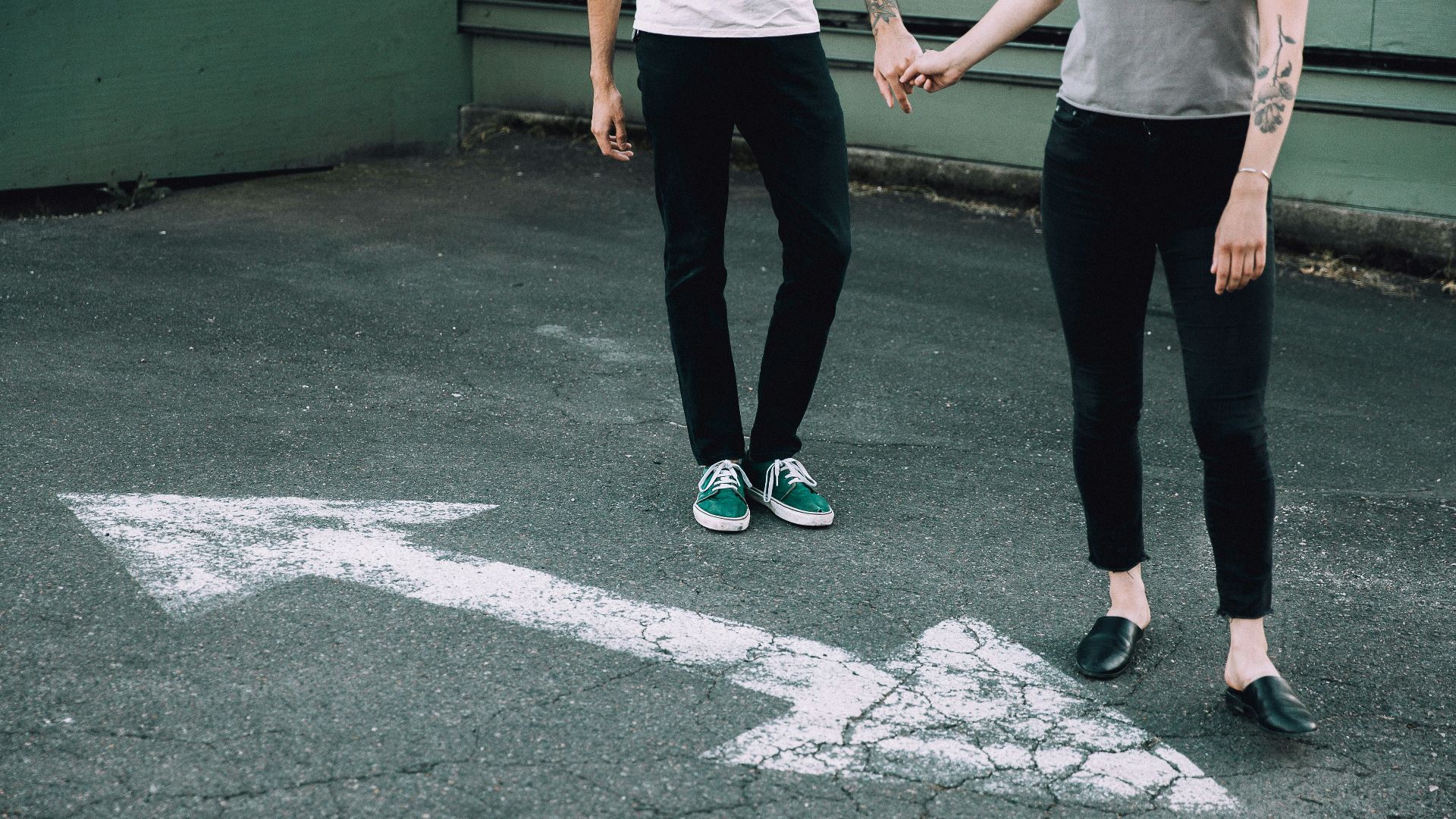 man and woman holding hands