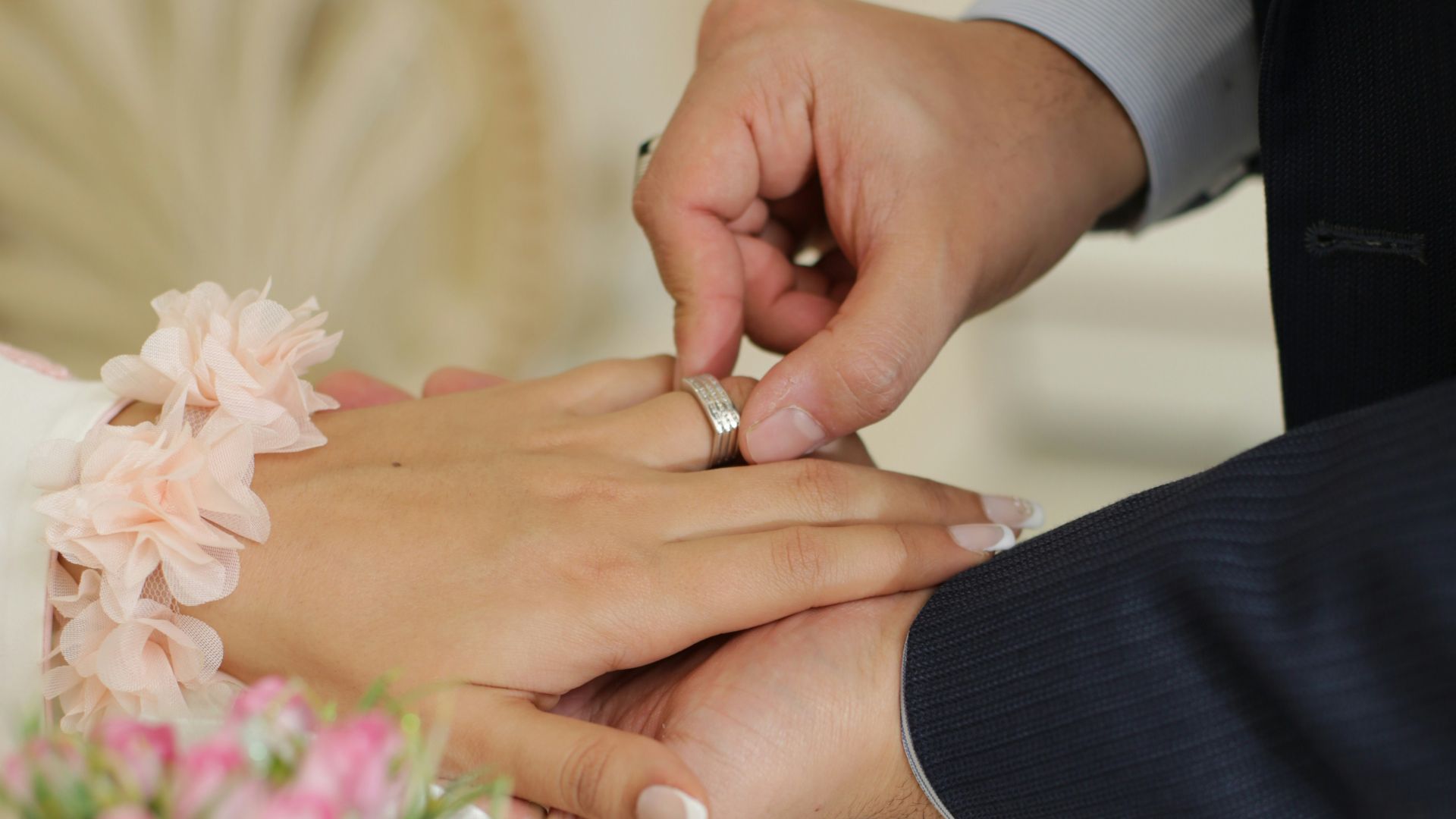 man and woman holding hands