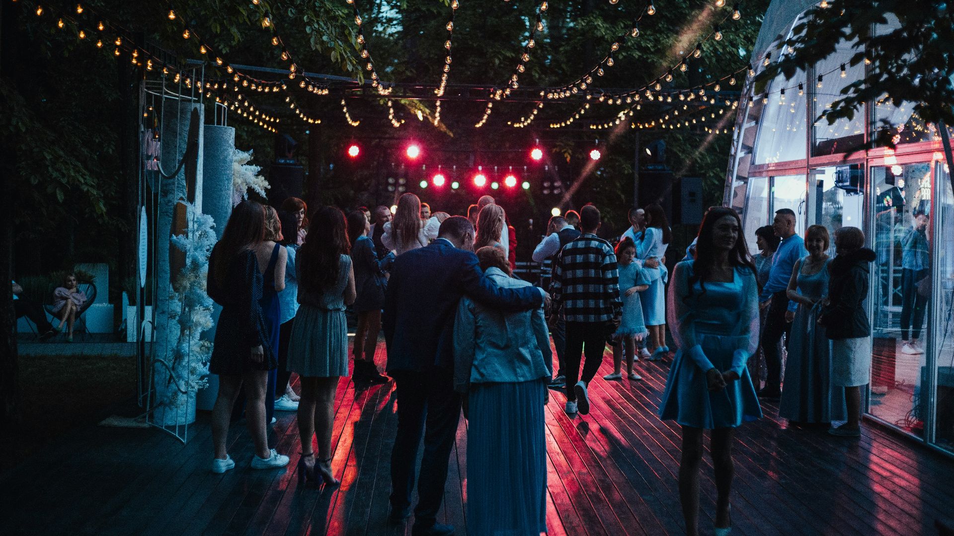 people walking on street during night time