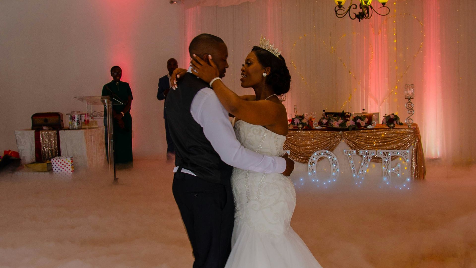bride and groom dancing on stage