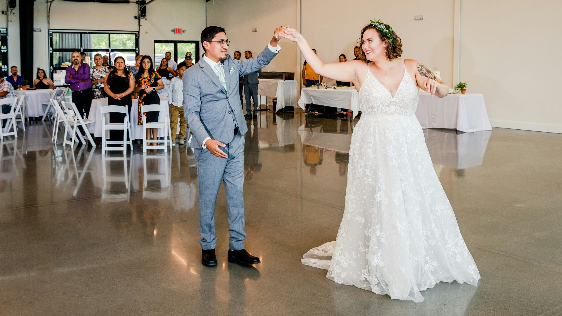 a bride and groom dancing at their wedding reception