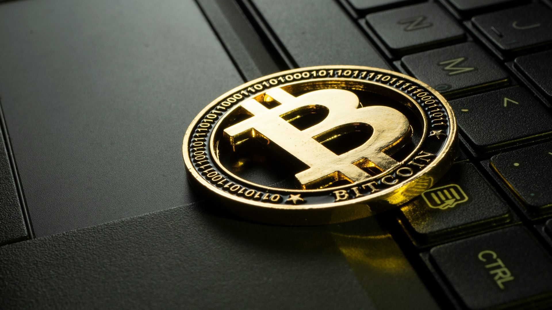 silver and black round emblem