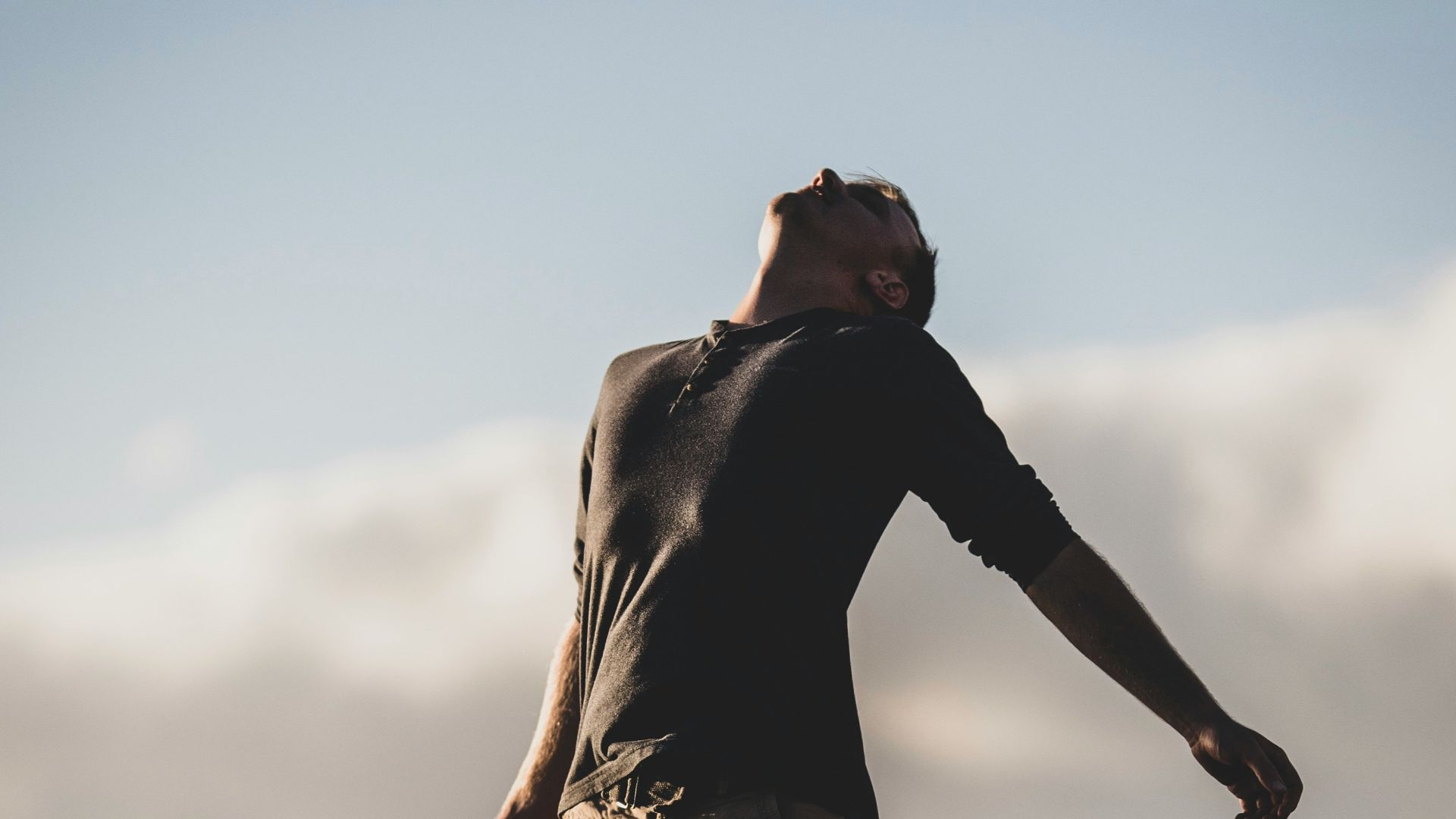 man standing near seashore