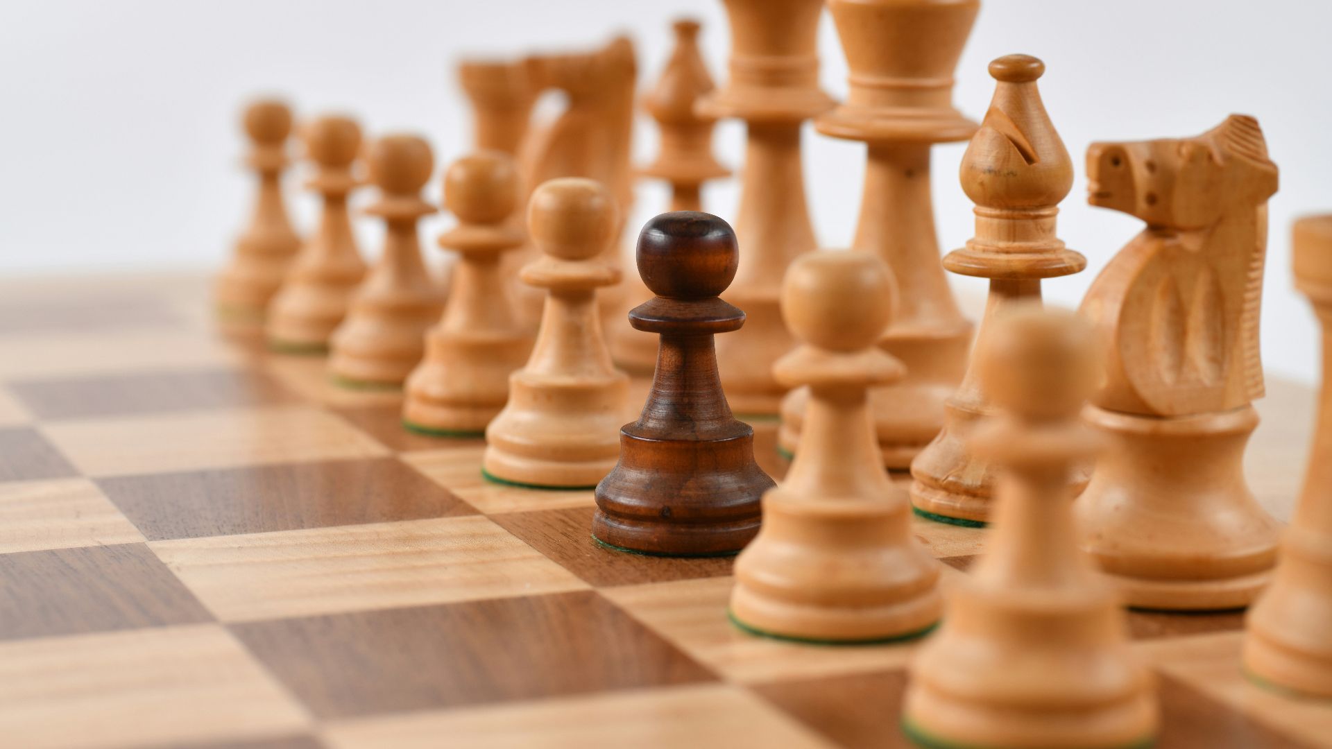 selective focus photography of chess pieces