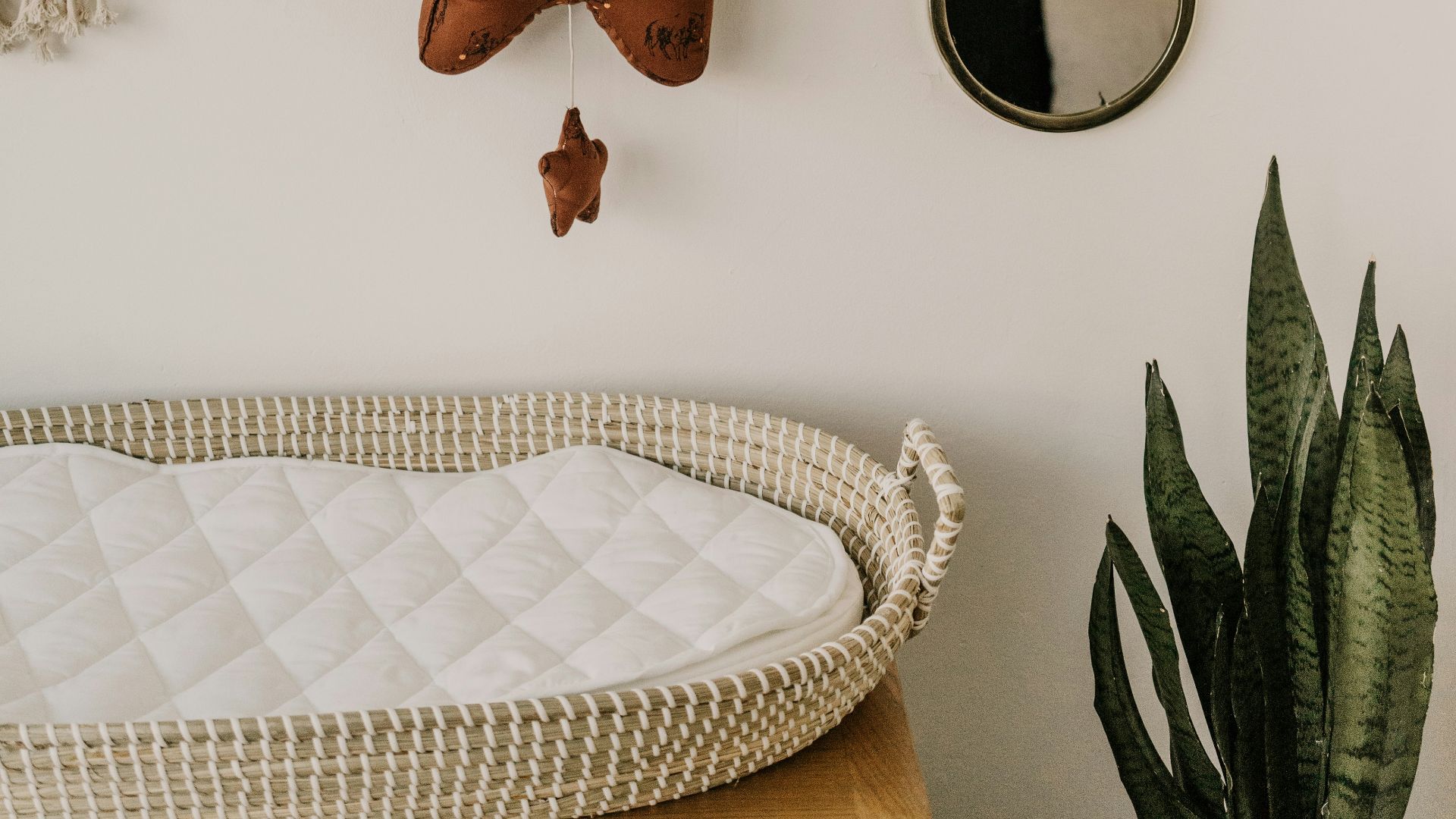 a person hanging upside down on a bed