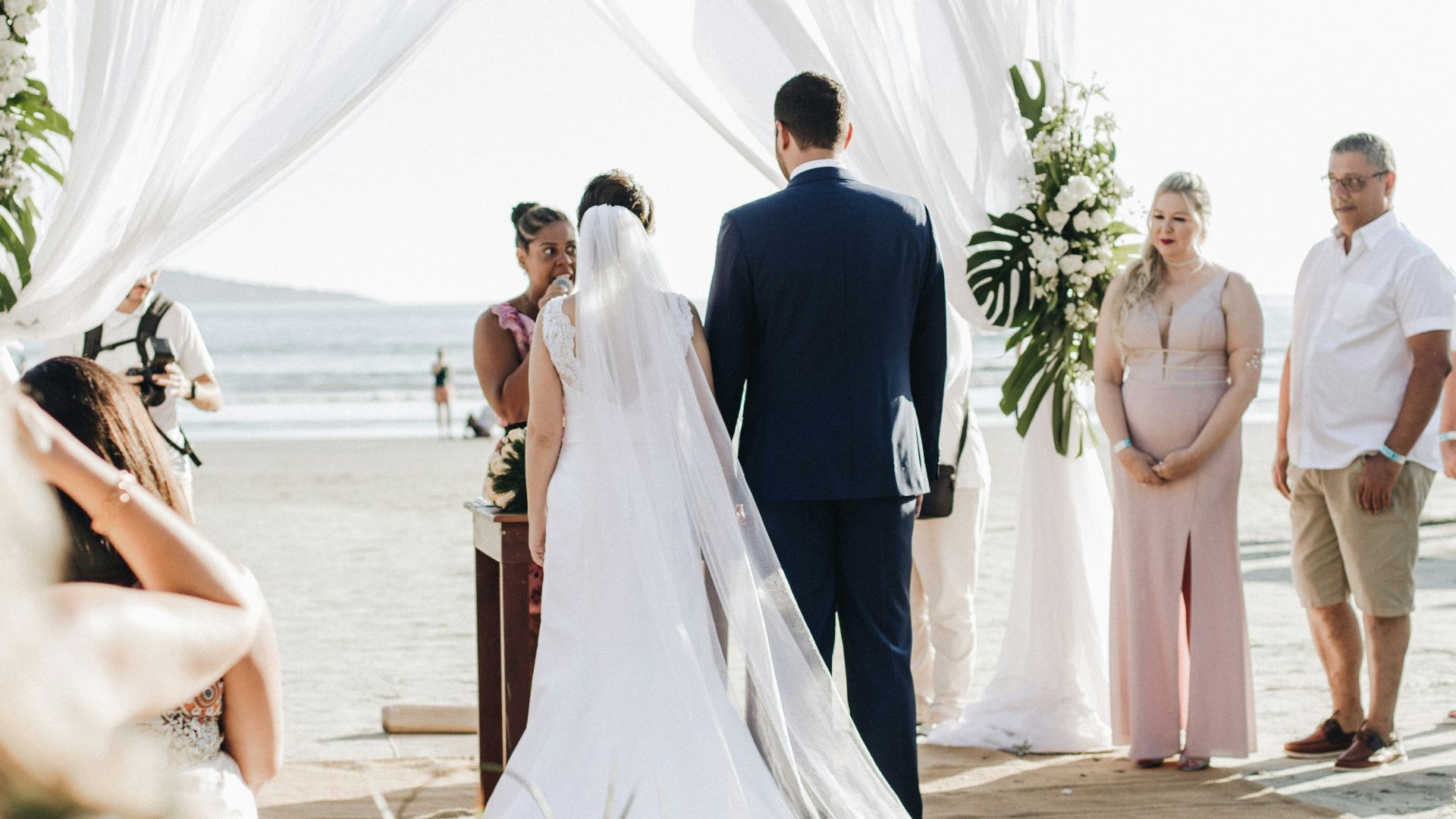 newly wed couple on isle getting married at shore