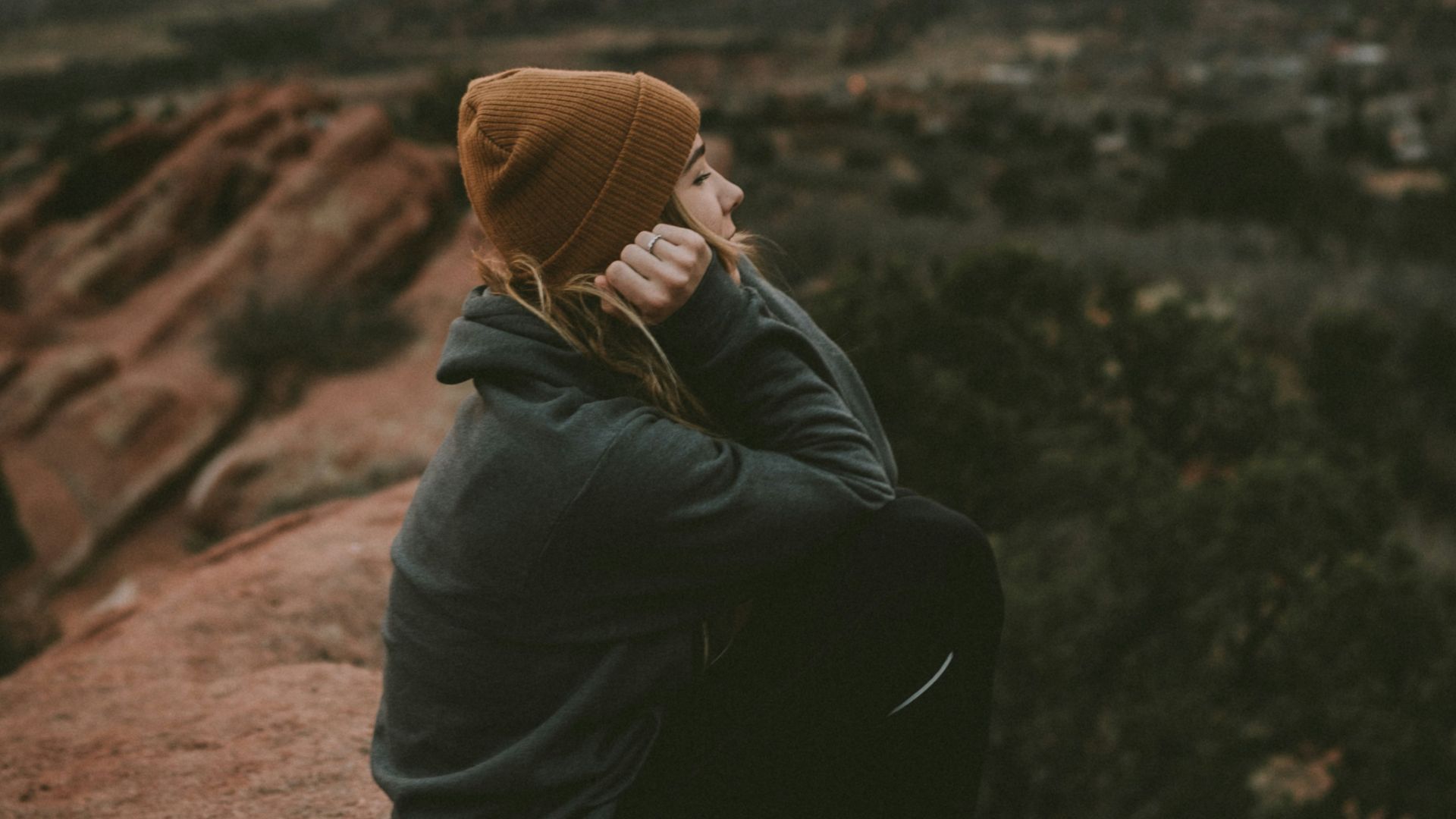 woman in green jacket