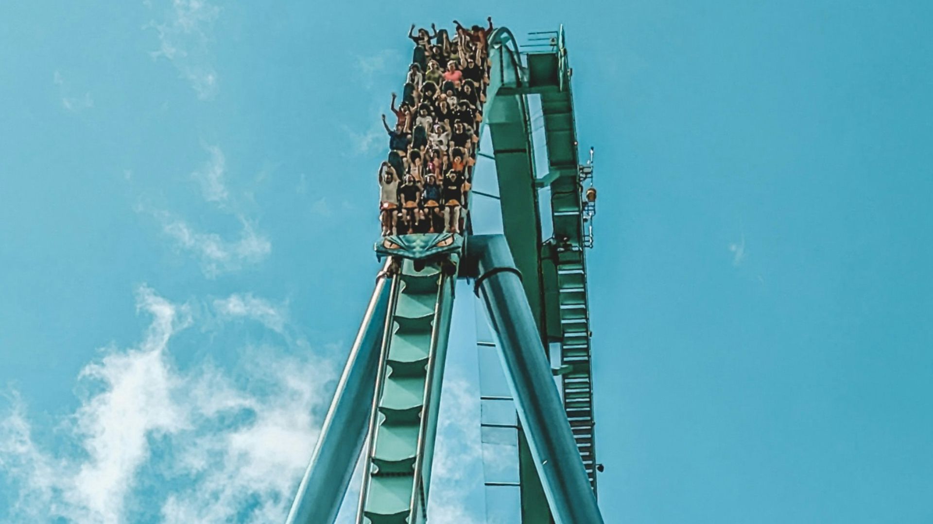 a roller coaster going up in the air