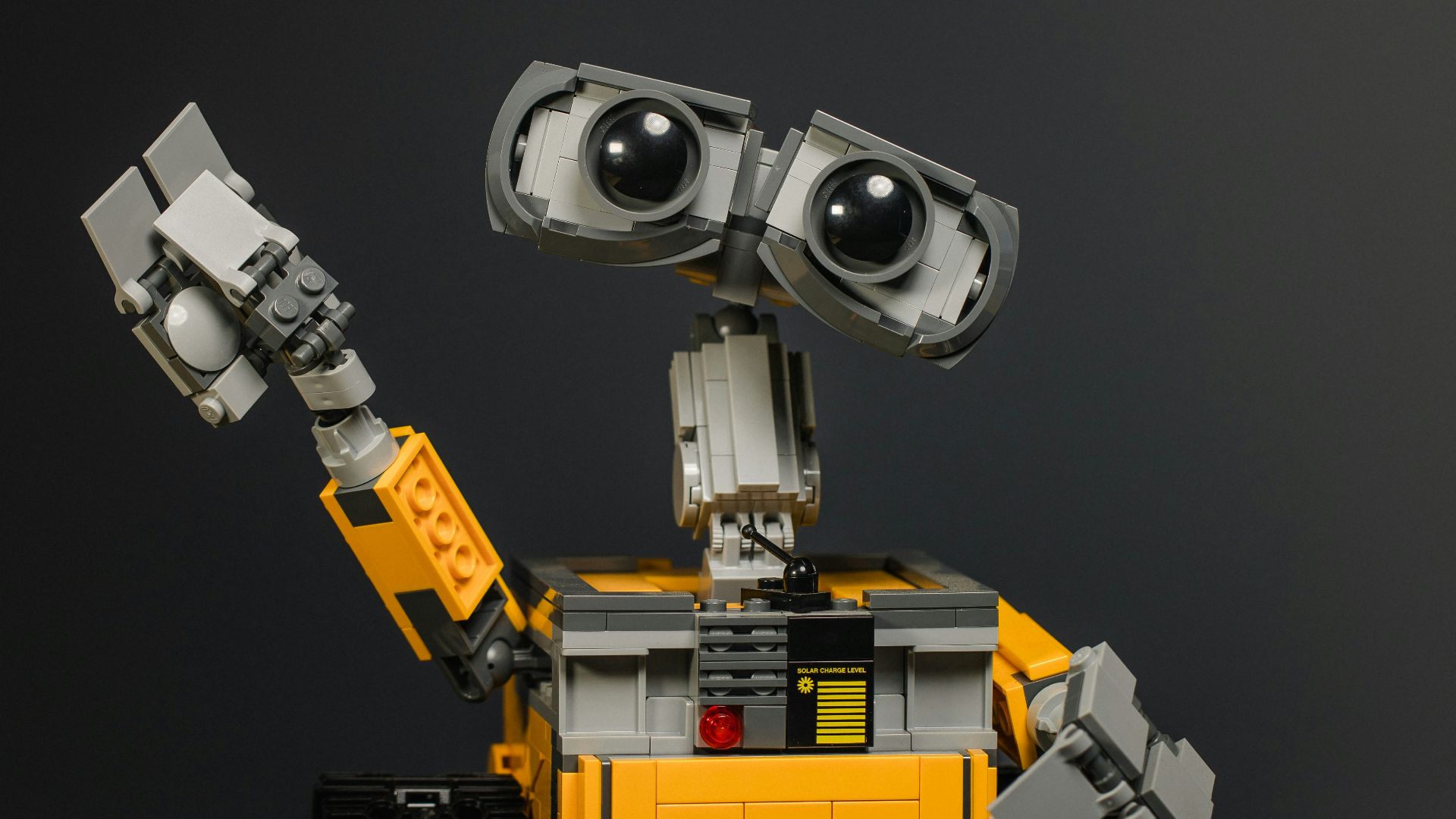 yellow and gray robot toy