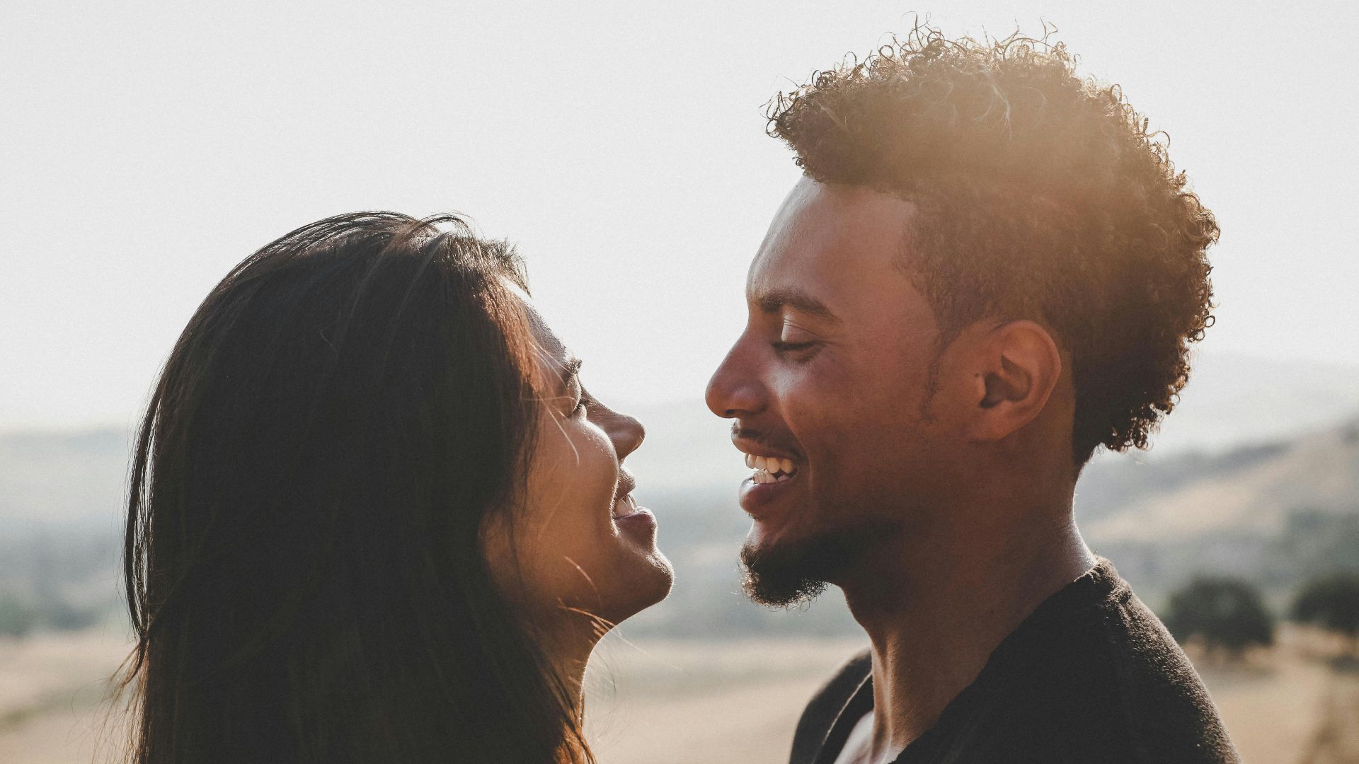 man and woman facing