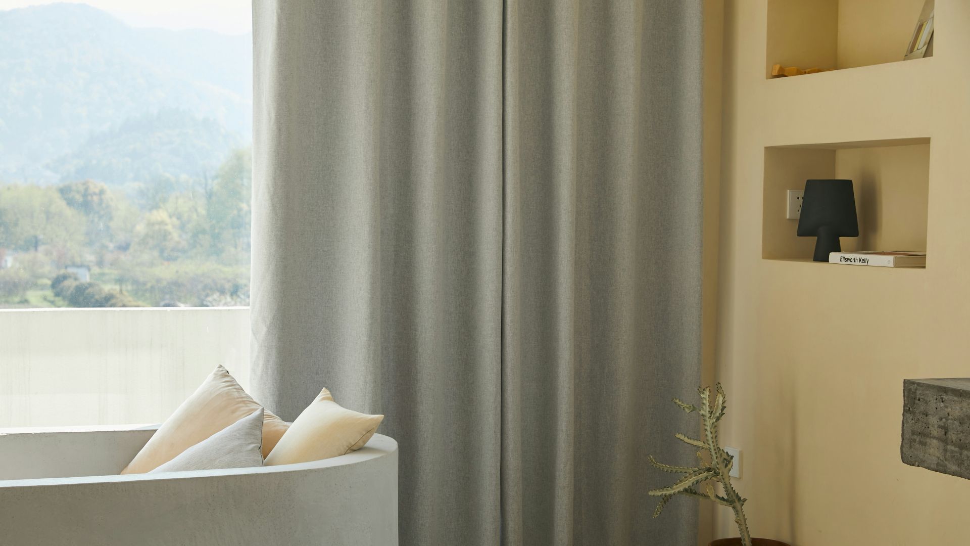 white throw pillow on white couch