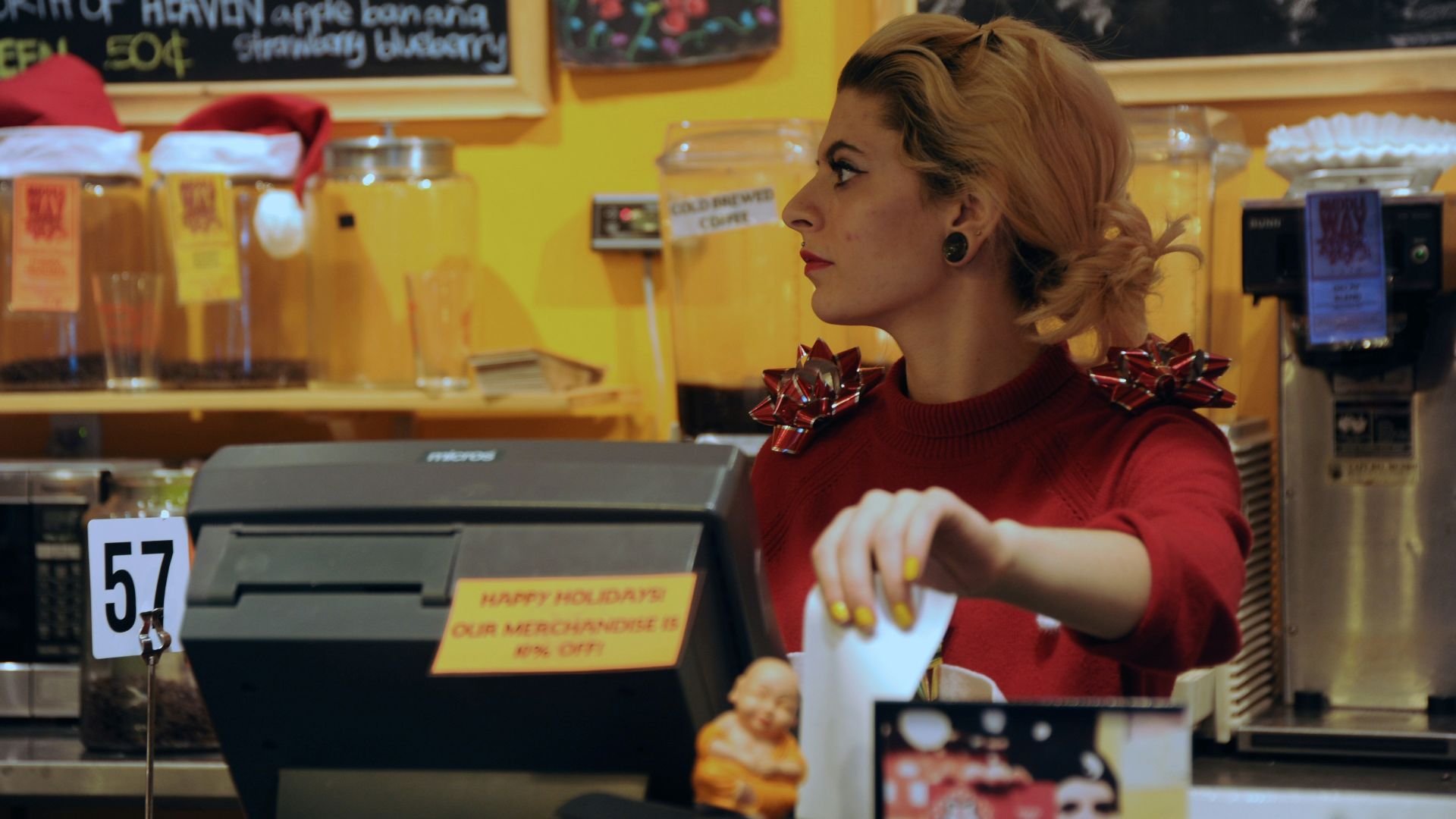 shallow focus photo of woman in red long-sleeved shirt