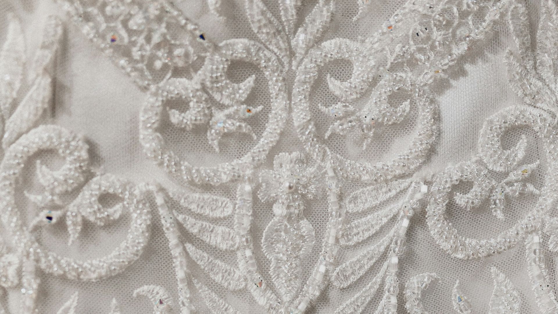 white floral lace textile on brown wooden table