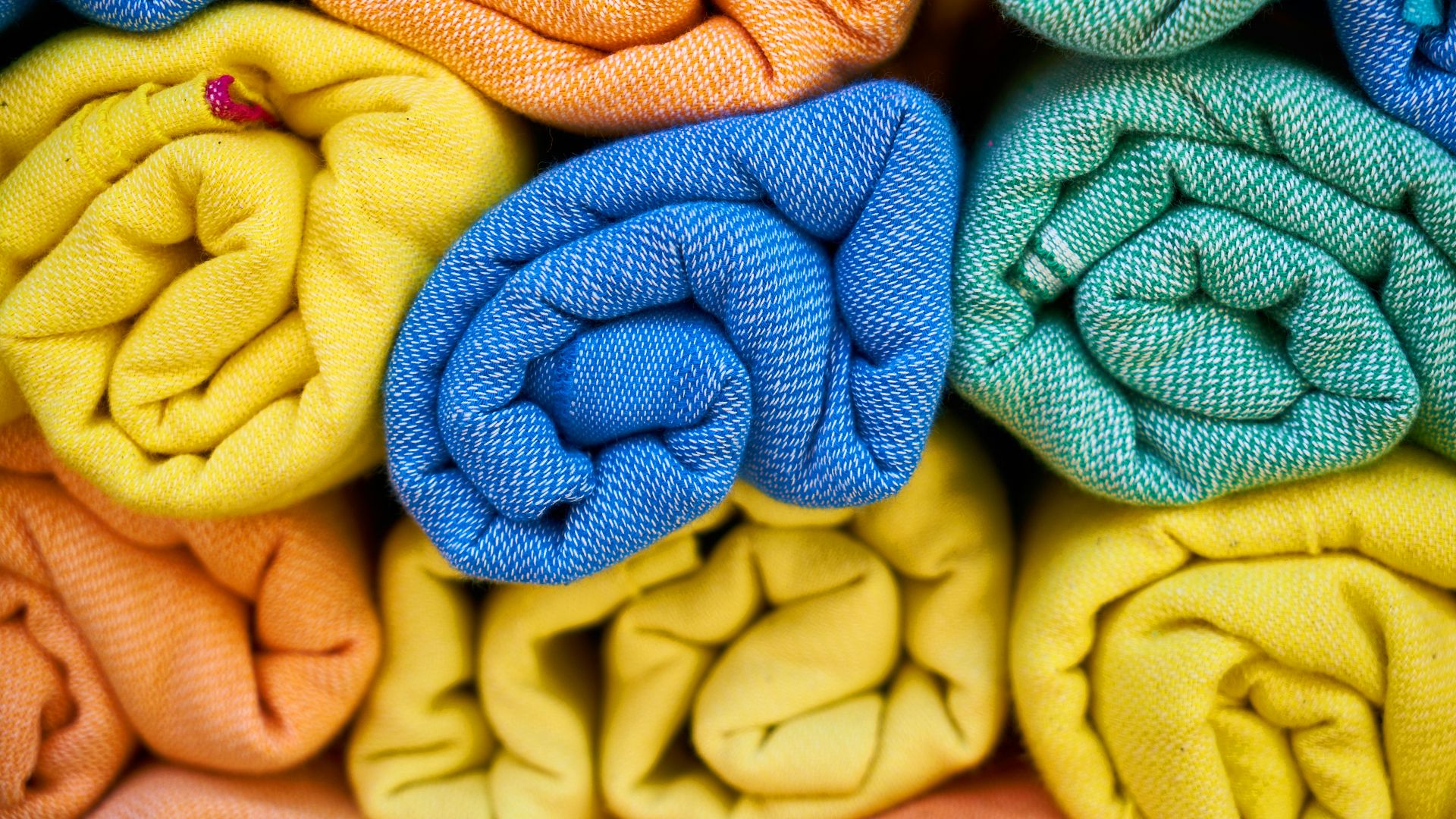 yellow and blue knit textile